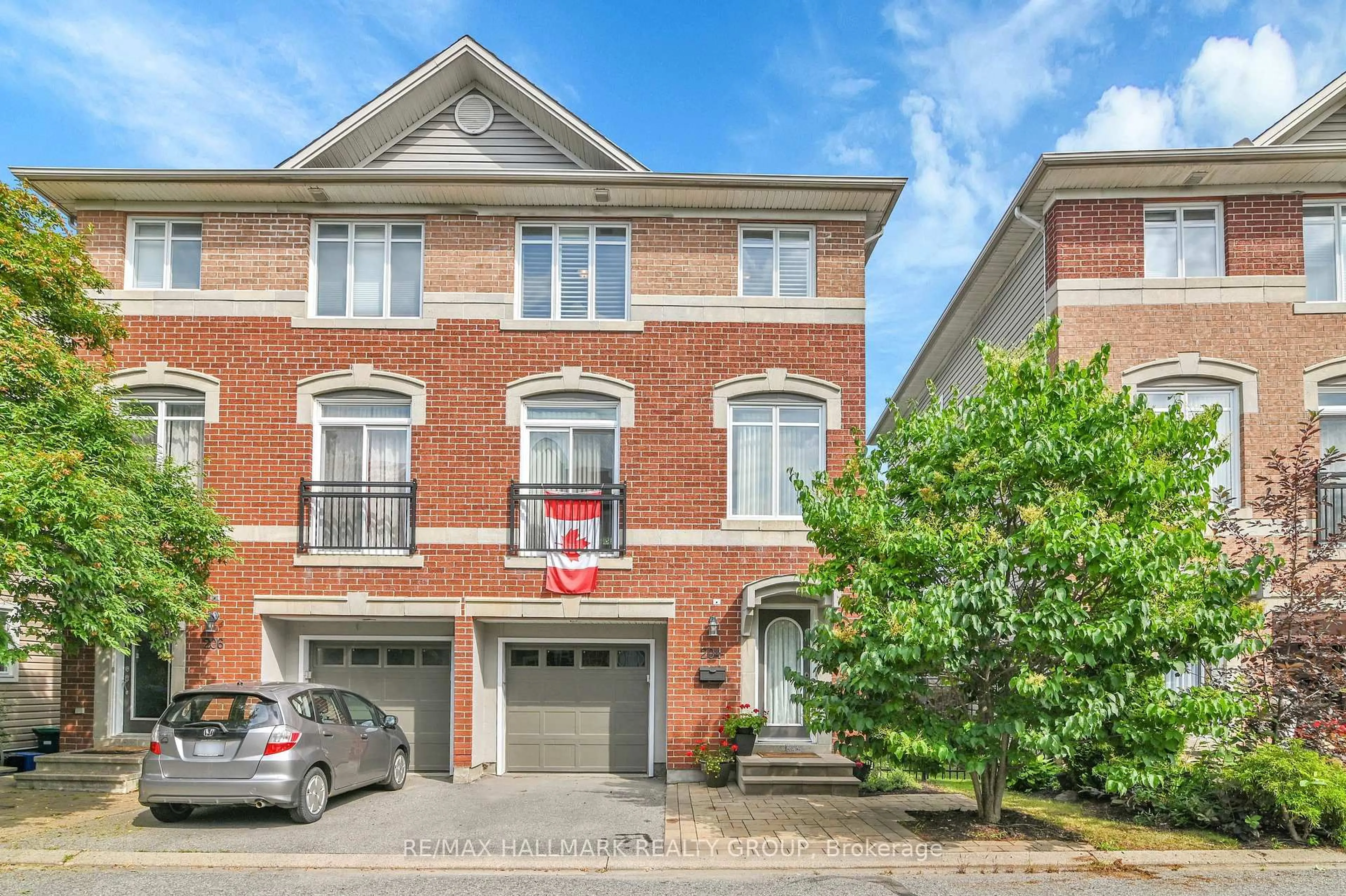 Home with brick exterior material, street for 204 West Village Private, Ottawa Ontario K1Z 1E4