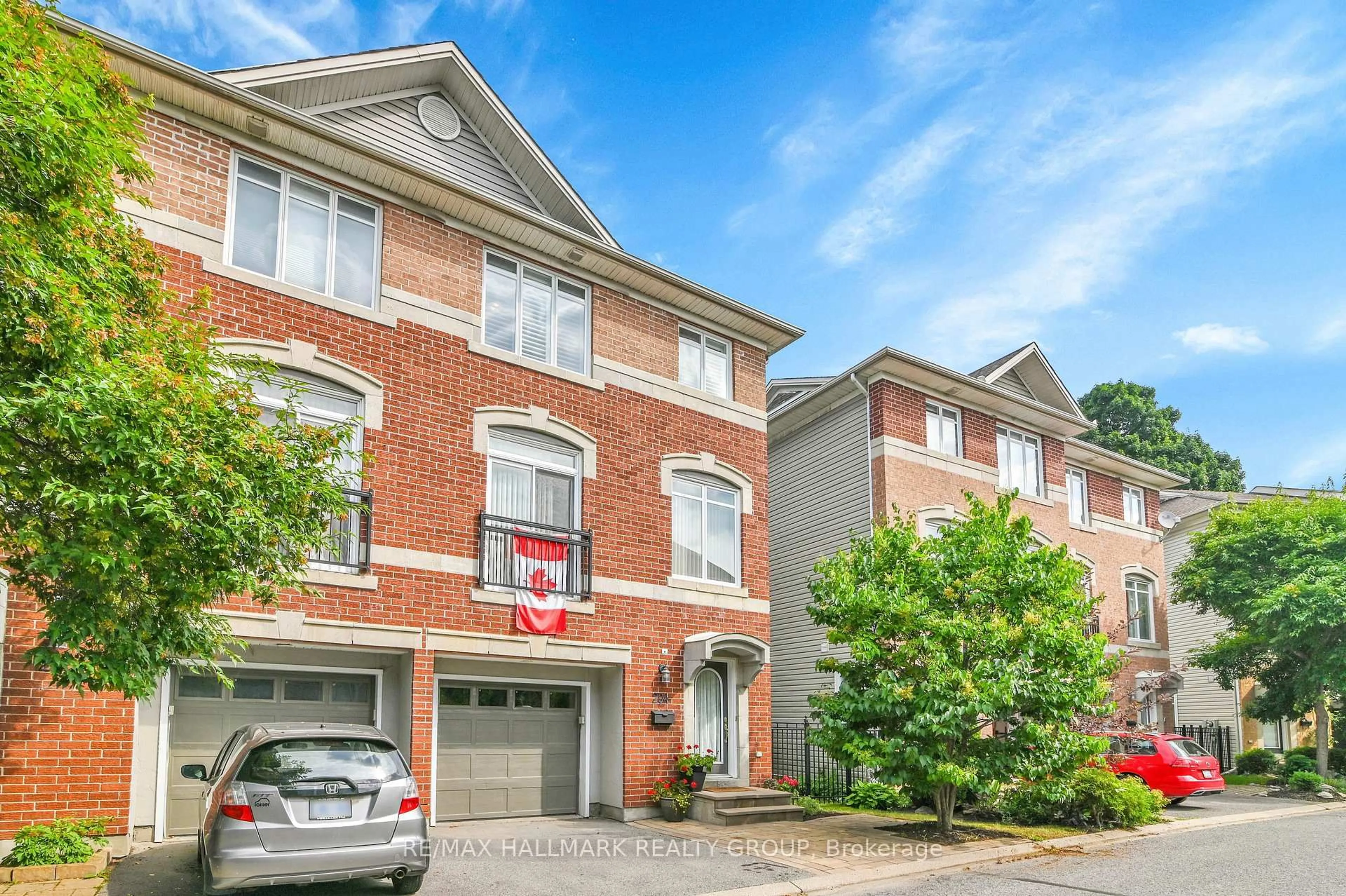 Home with brick exterior material, street for 204 West Village Private, Ottawa Ontario K1Z 1E4