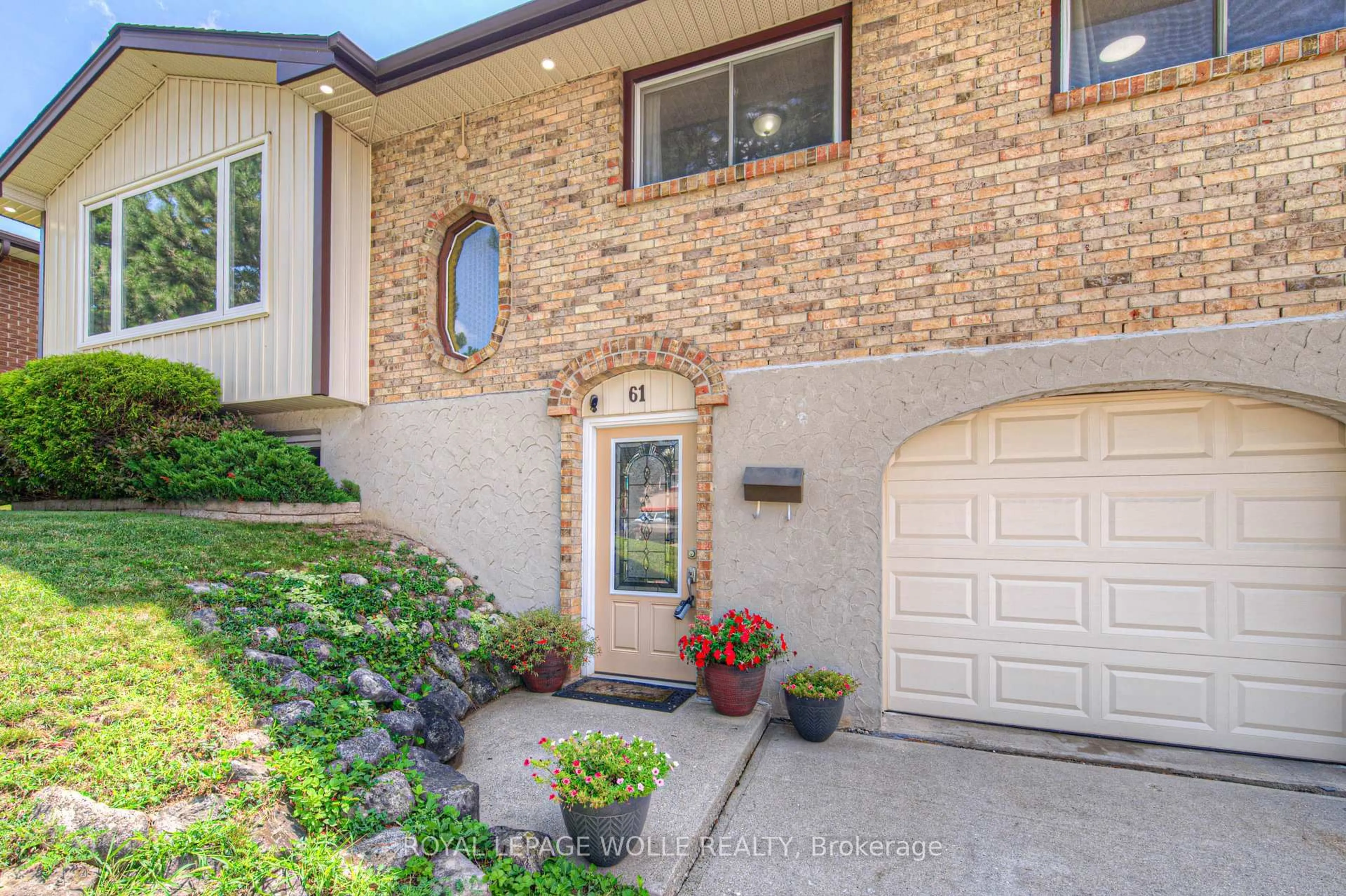 Home with brick exterior material, street for 61 Bluerock Cres, Cambridge Ontario N1R 7B7