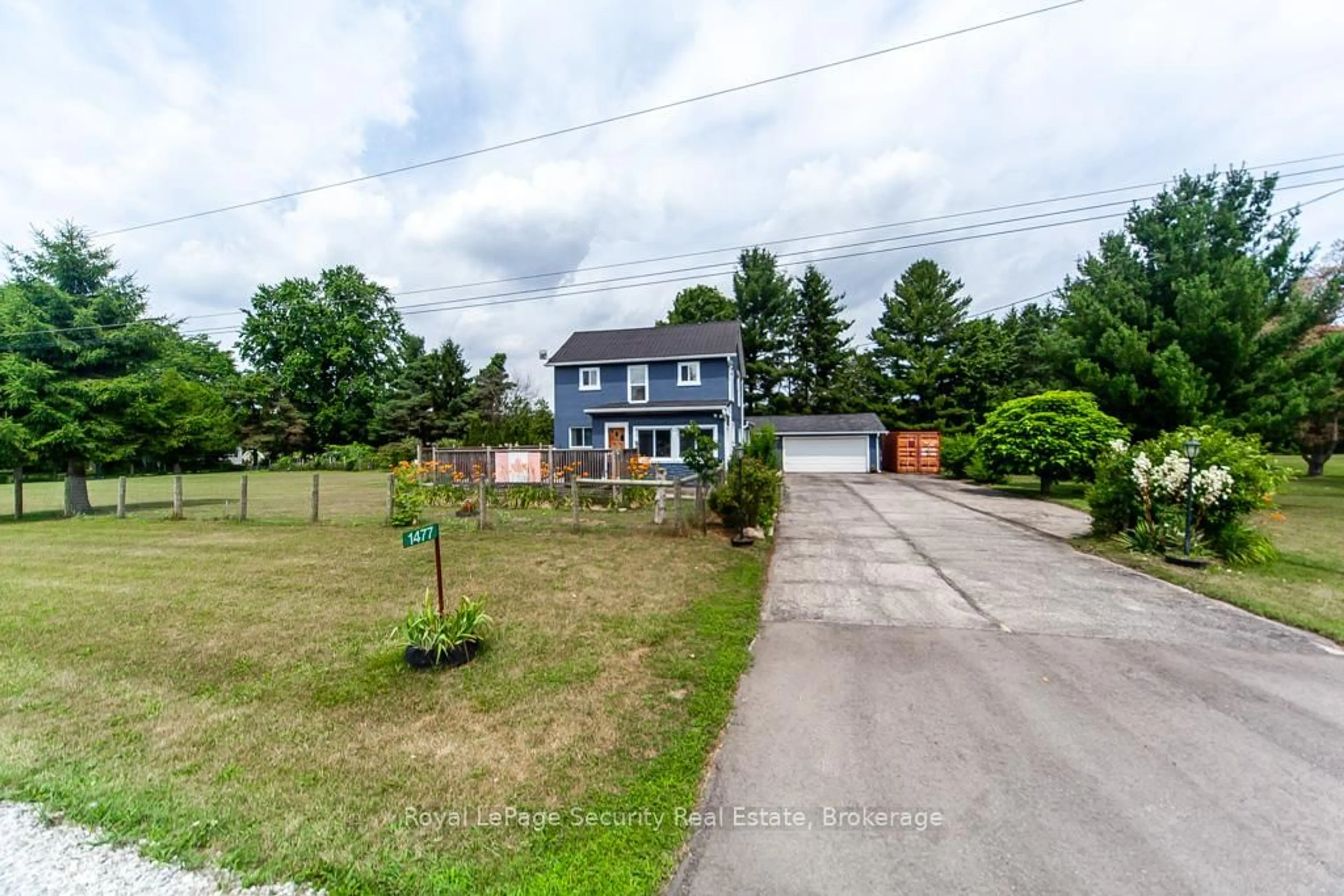 A pic from outside/outdoor area/front of a property/back of a property/a pic from drone, street for 1477 Windham Centre Rd, Norfolk Ontario N0E 2A0