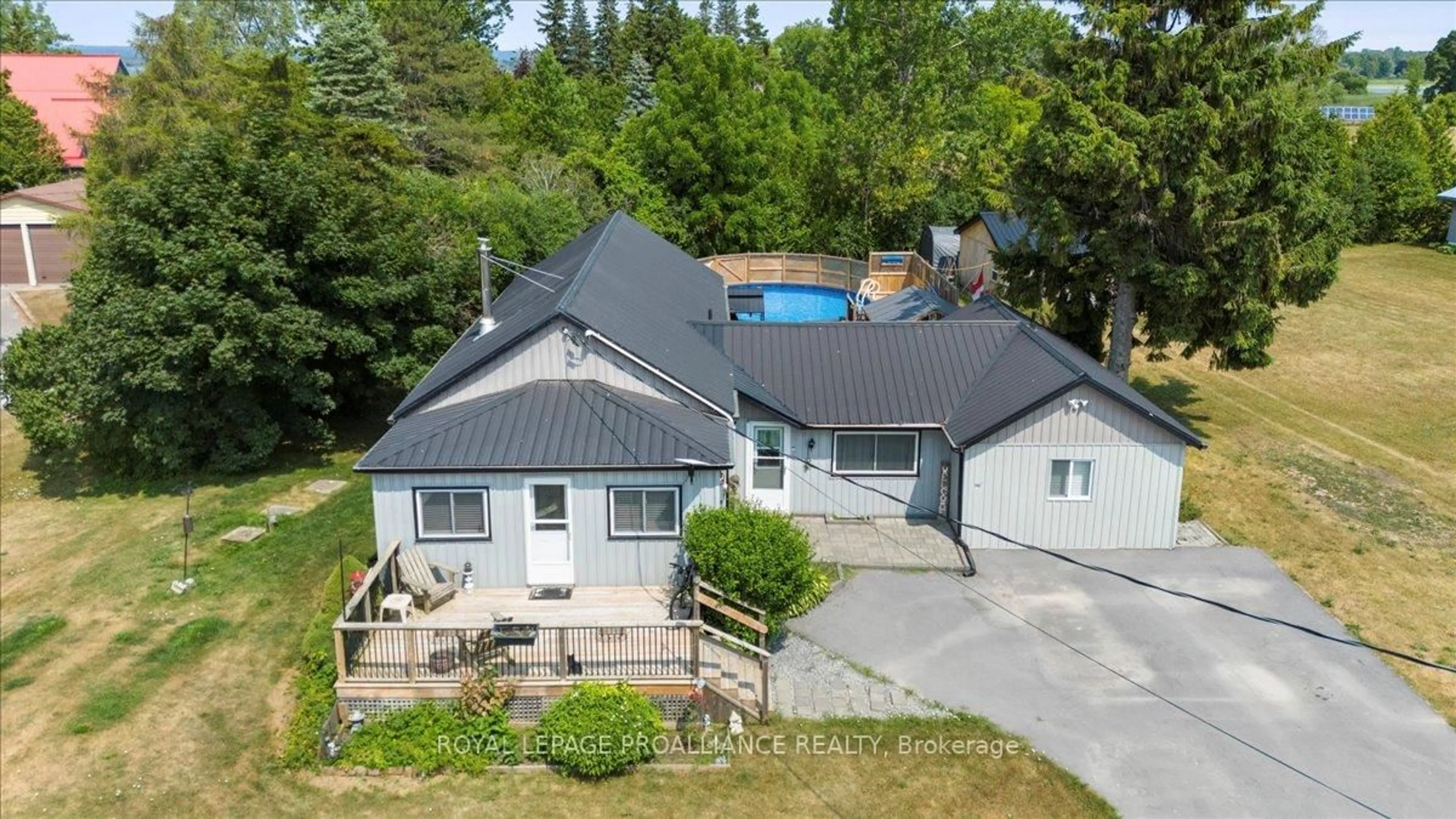 A pic from outside/outdoor area/front of a property/back of a property/a pic from drone, unknown for 644 Smokes Point Rd, Prince Edward County Ontario K0K 1L0