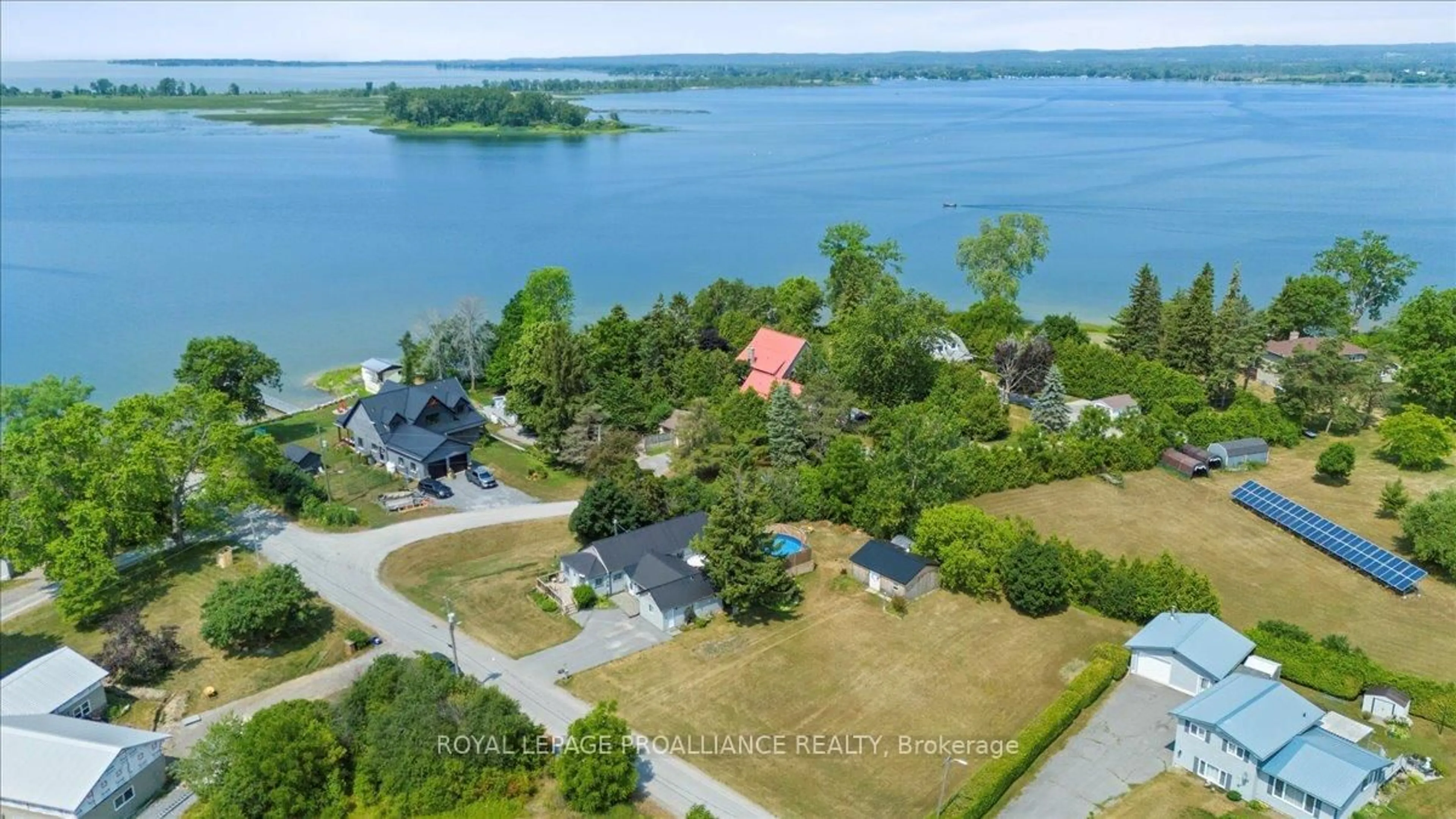 A pic from outside/outdoor area/front of a property/back of a property/a pic from drone, water/lake/river/ocean view for 644 Smokes Point Rd, Prince Edward County Ontario K0K 1L0