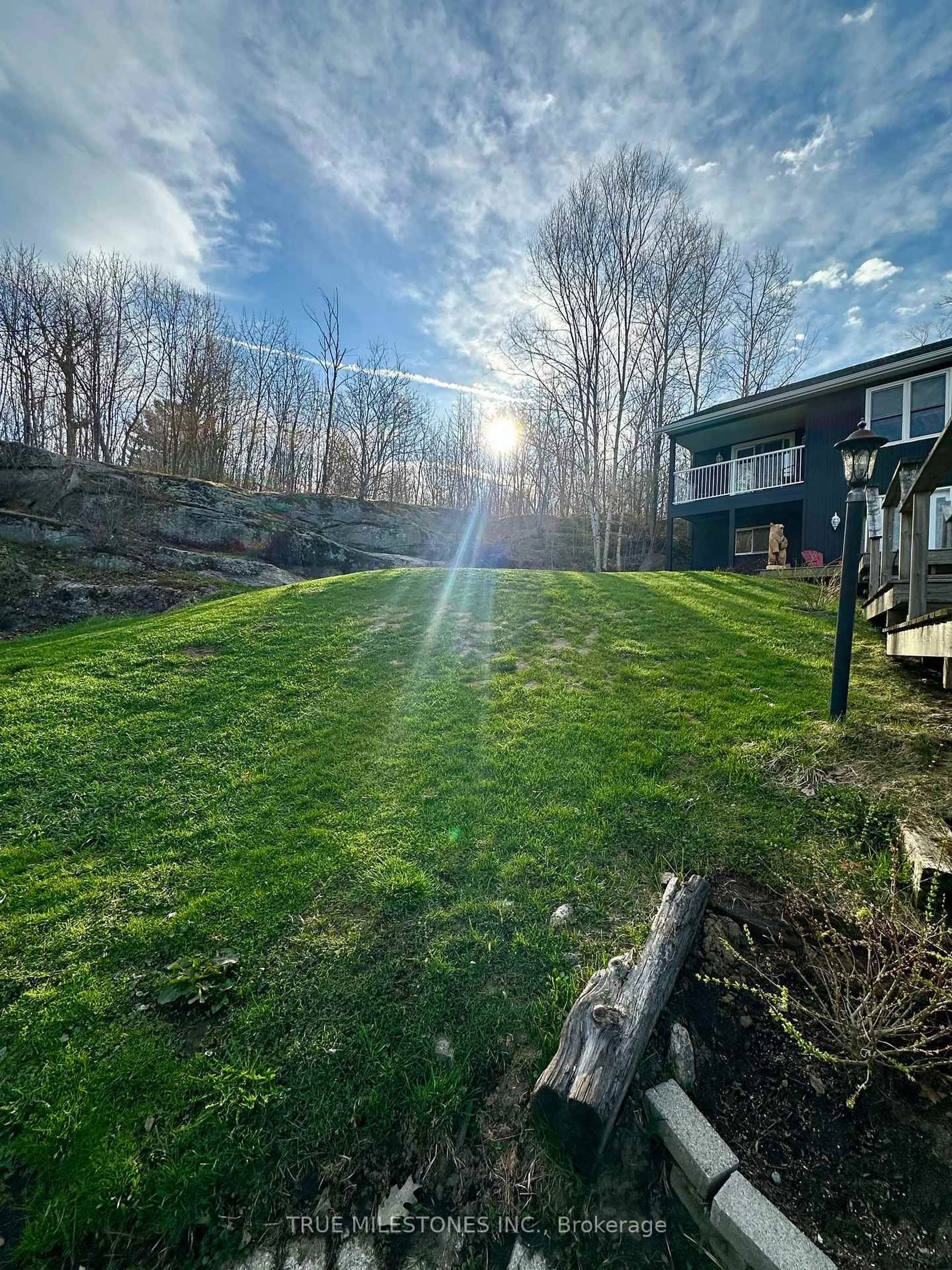 A pic from outside/outdoor area/front of a property/back of a property/a pic from drone, water/lake/river/ocean view for 336 Clear Lake Rd, Seguin Ontario P2A 2W8