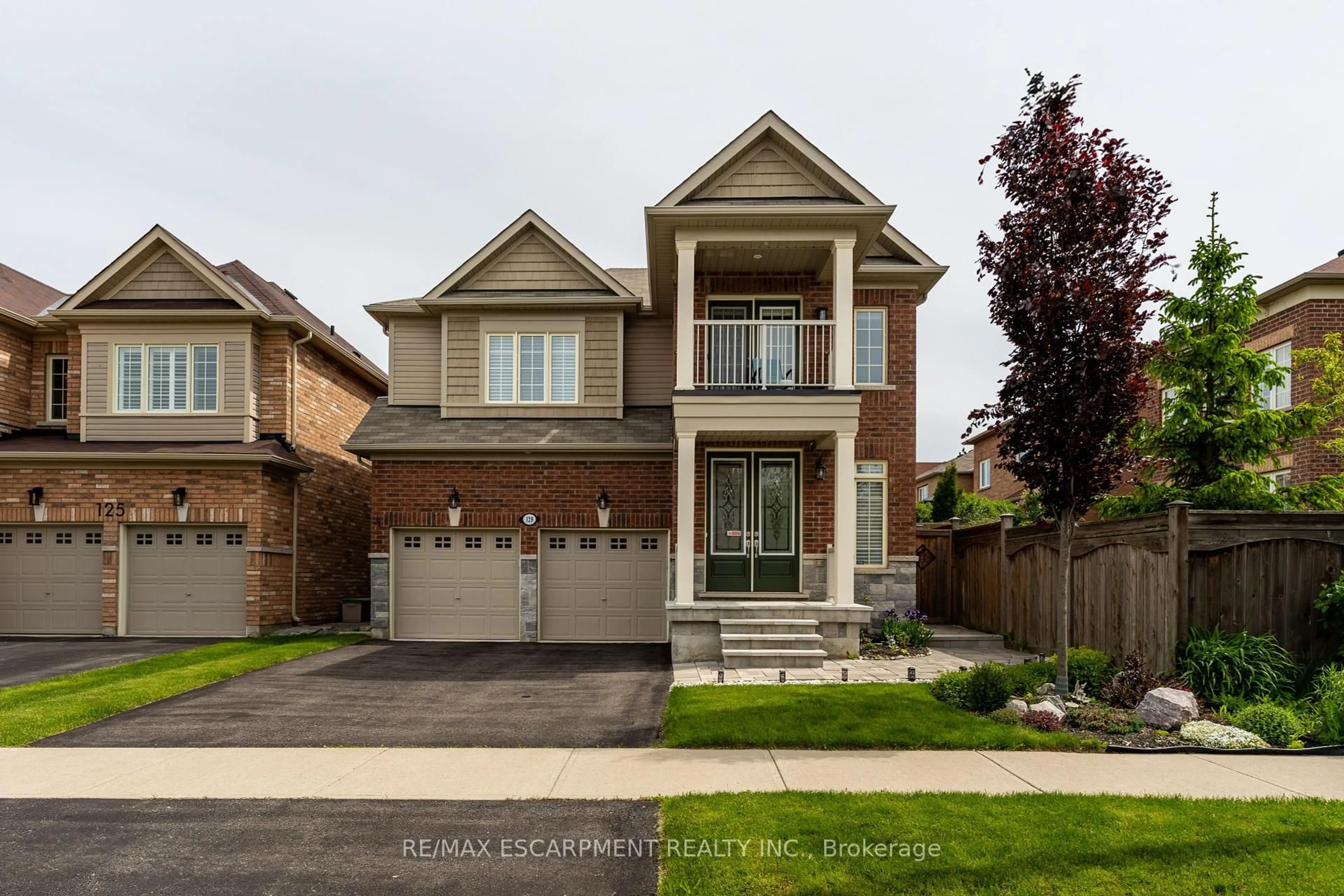 Home with brick exterior material, street for 129 Fingland Cres, Hamilton Ontario L8B 0S7