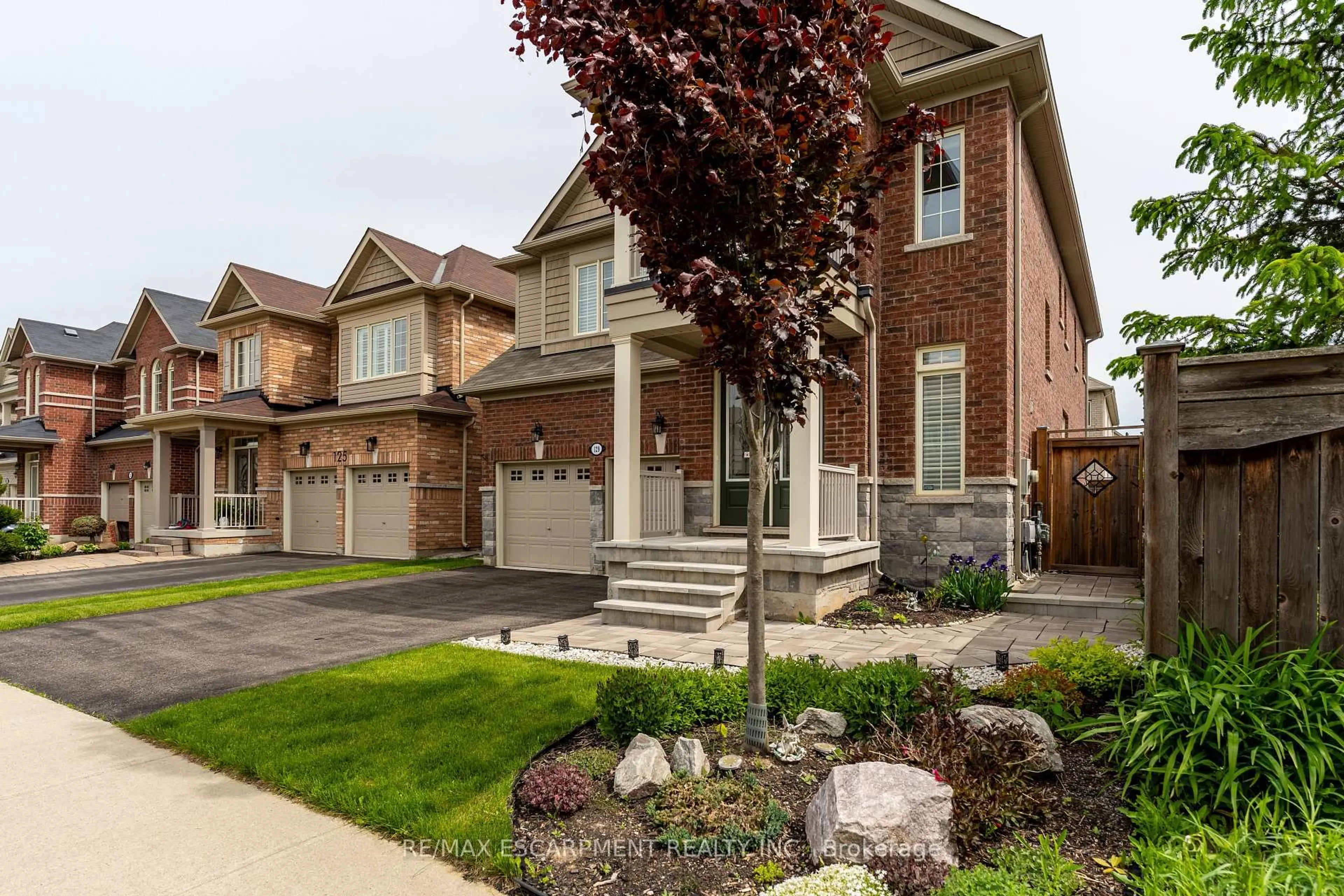 Home with brick exterior material, street for 129 Fingland Cres, Hamilton Ontario L8B 0S7