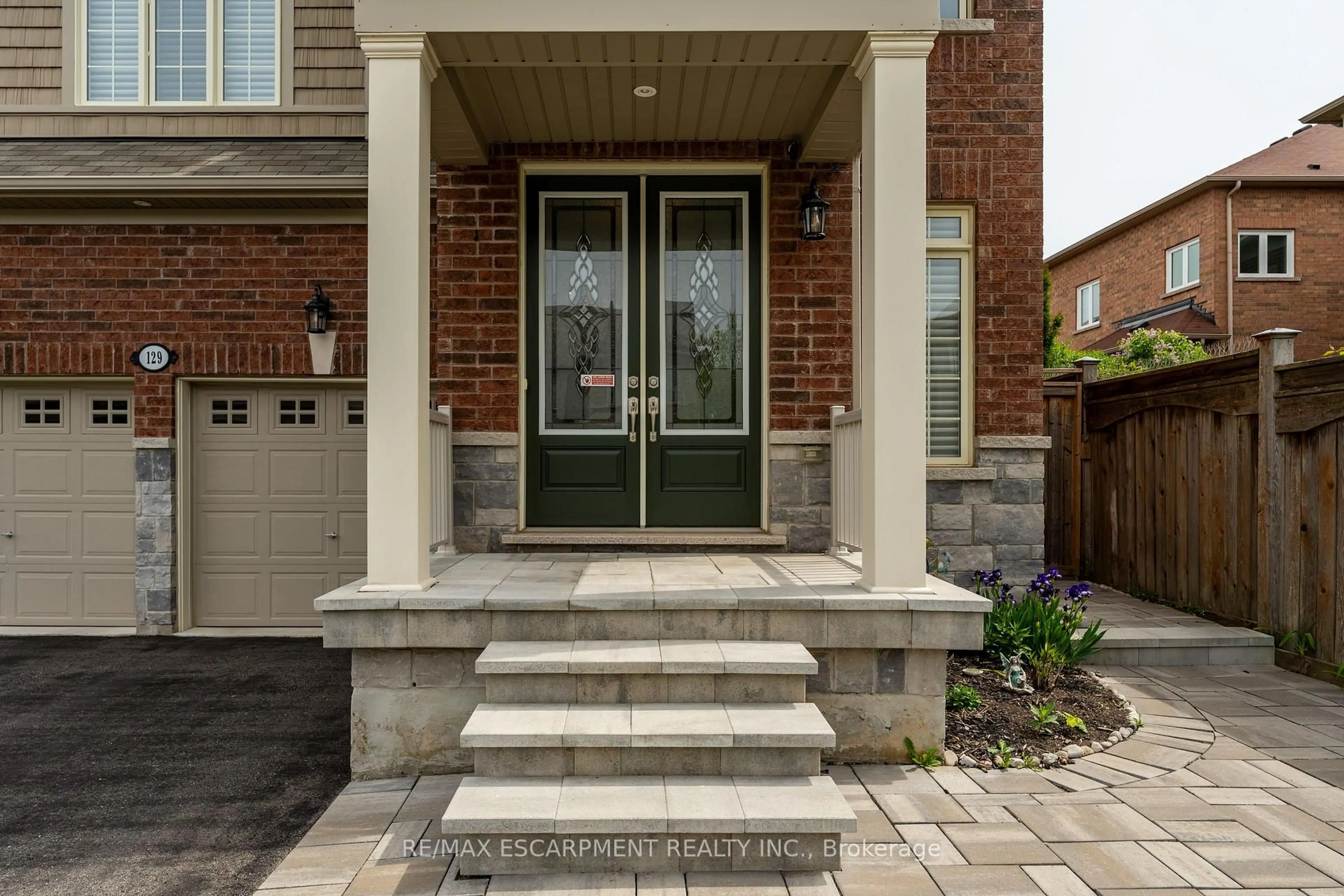 Home with brick exterior material, street for 129 Fingland Cres, Hamilton Ontario L8B 0S7