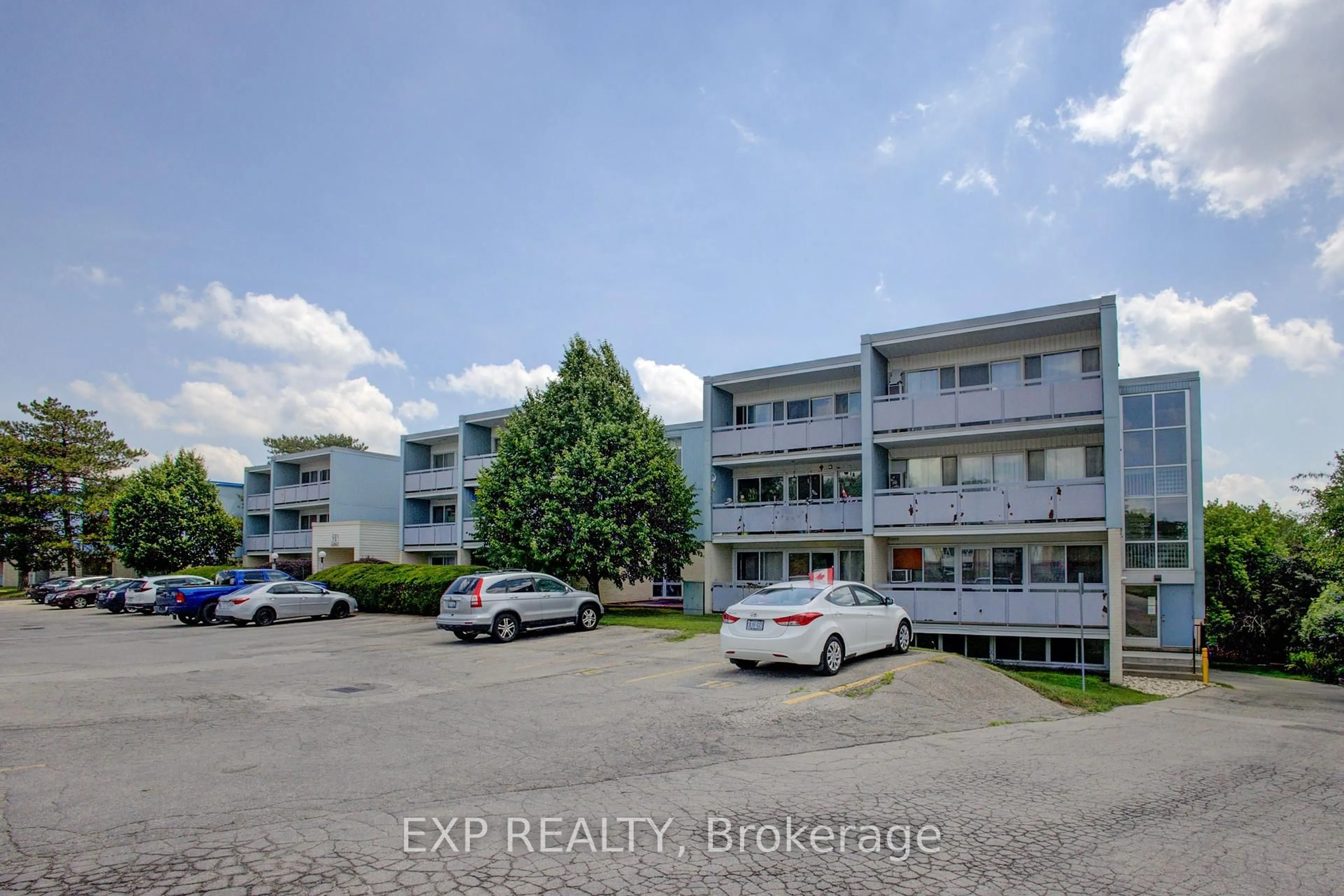 A pic from outside/outdoor area/front of a property/back of a property/a pic from drone, building for 91 Conroy Cres #202, Guelph Ontario N1G 2V5
