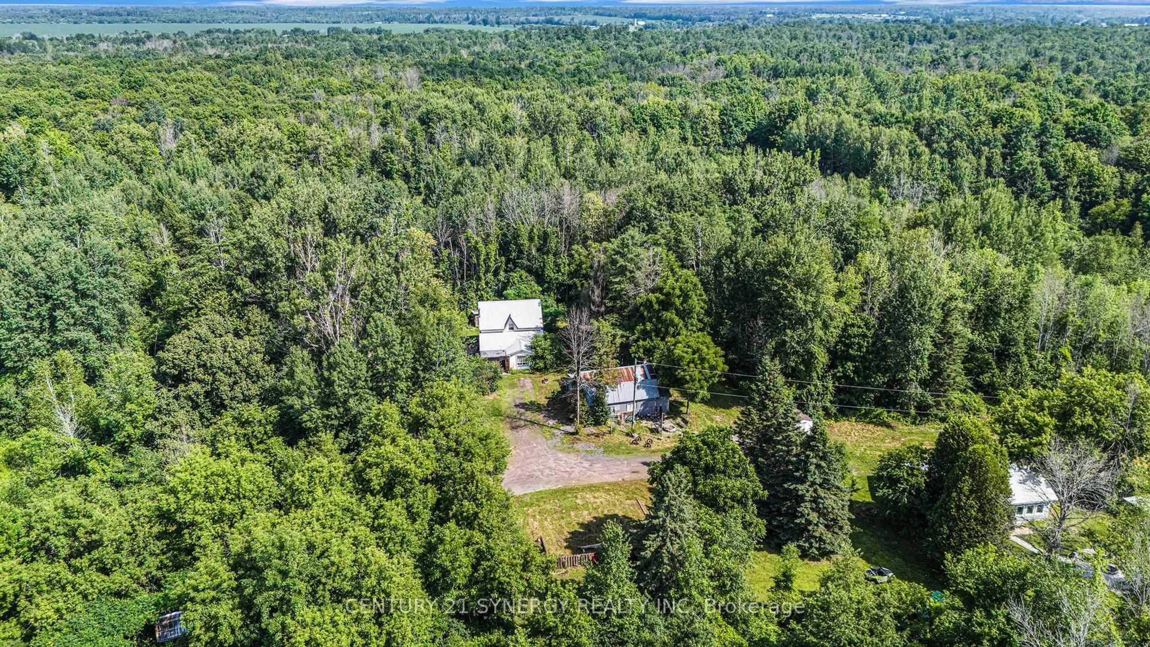 A pic from outside/outdoor area/front of a property/back of a property/a pic from drone, forest/trees view for 804-806 Monkman Rd, North Grenville Ontario K0G 1N0