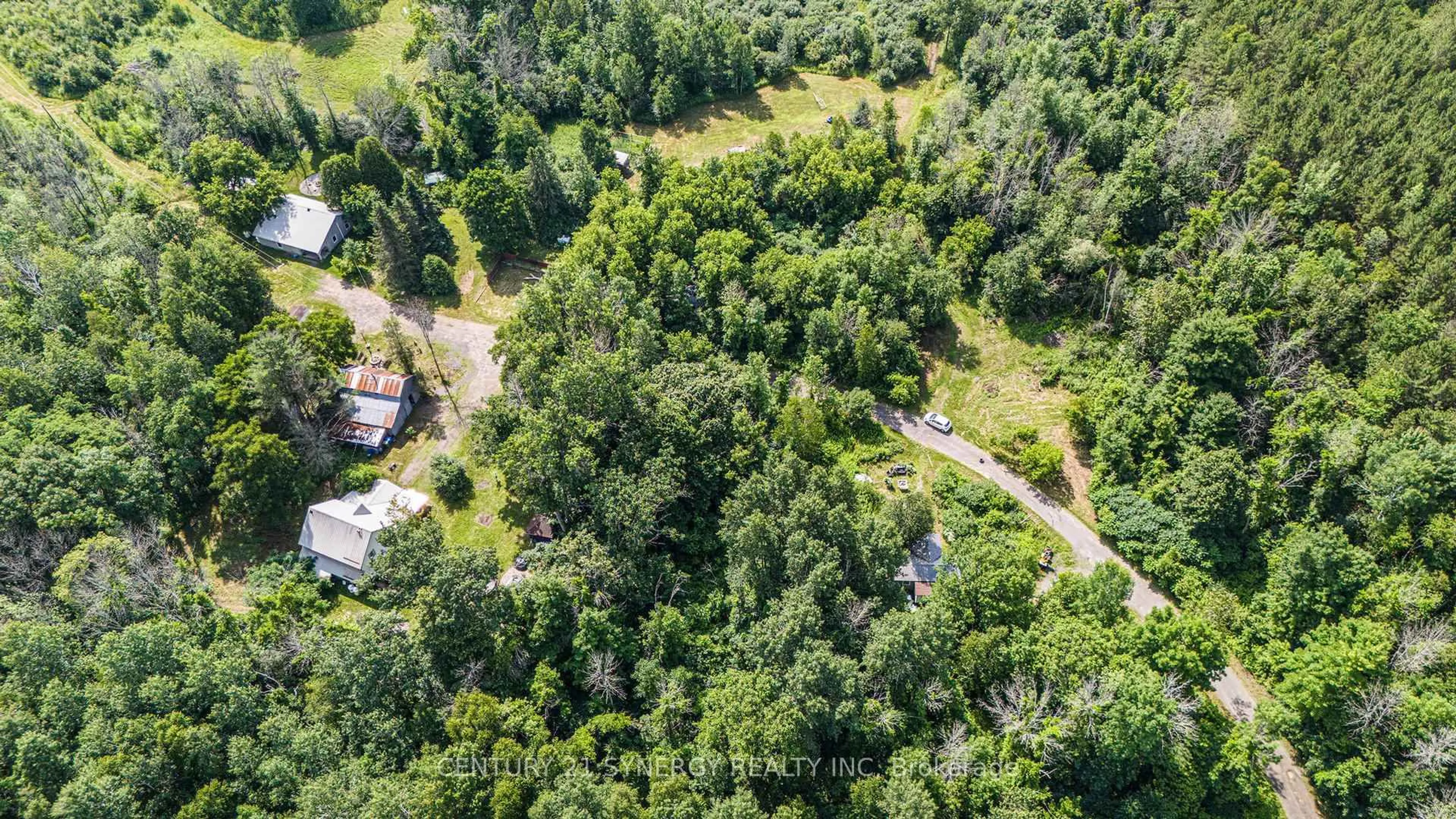 A pic from outside/outdoor area/front of a property/back of a property/a pic from drone, forest/trees view for 804-806 Monkman Rd, North Grenville Ontario K0G 1N0