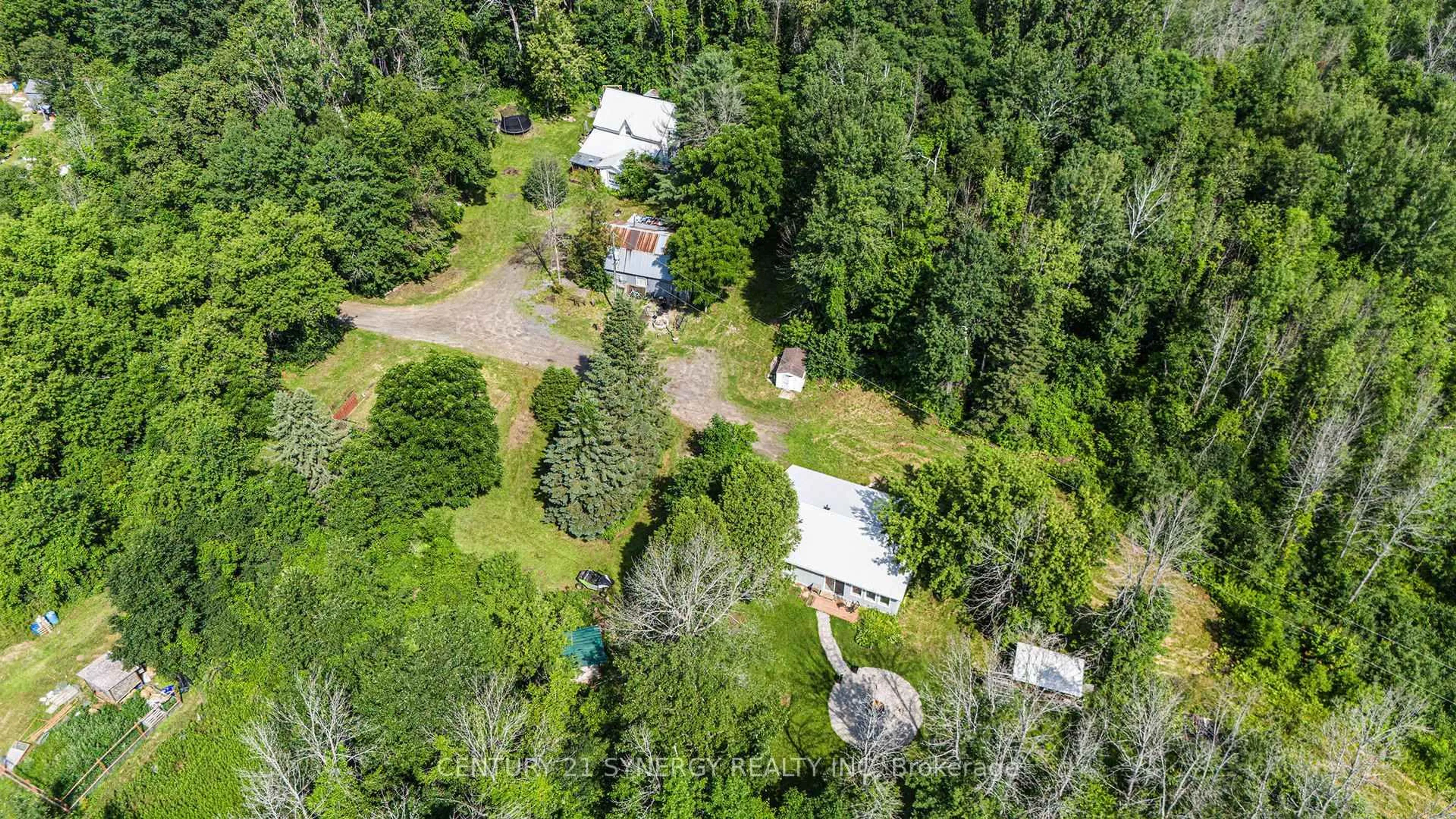 A pic from outside/outdoor area/front of a property/back of a property/a pic from drone, forest/trees view for 804-806 Monkman Rd, North Grenville Ontario K0G 1N0