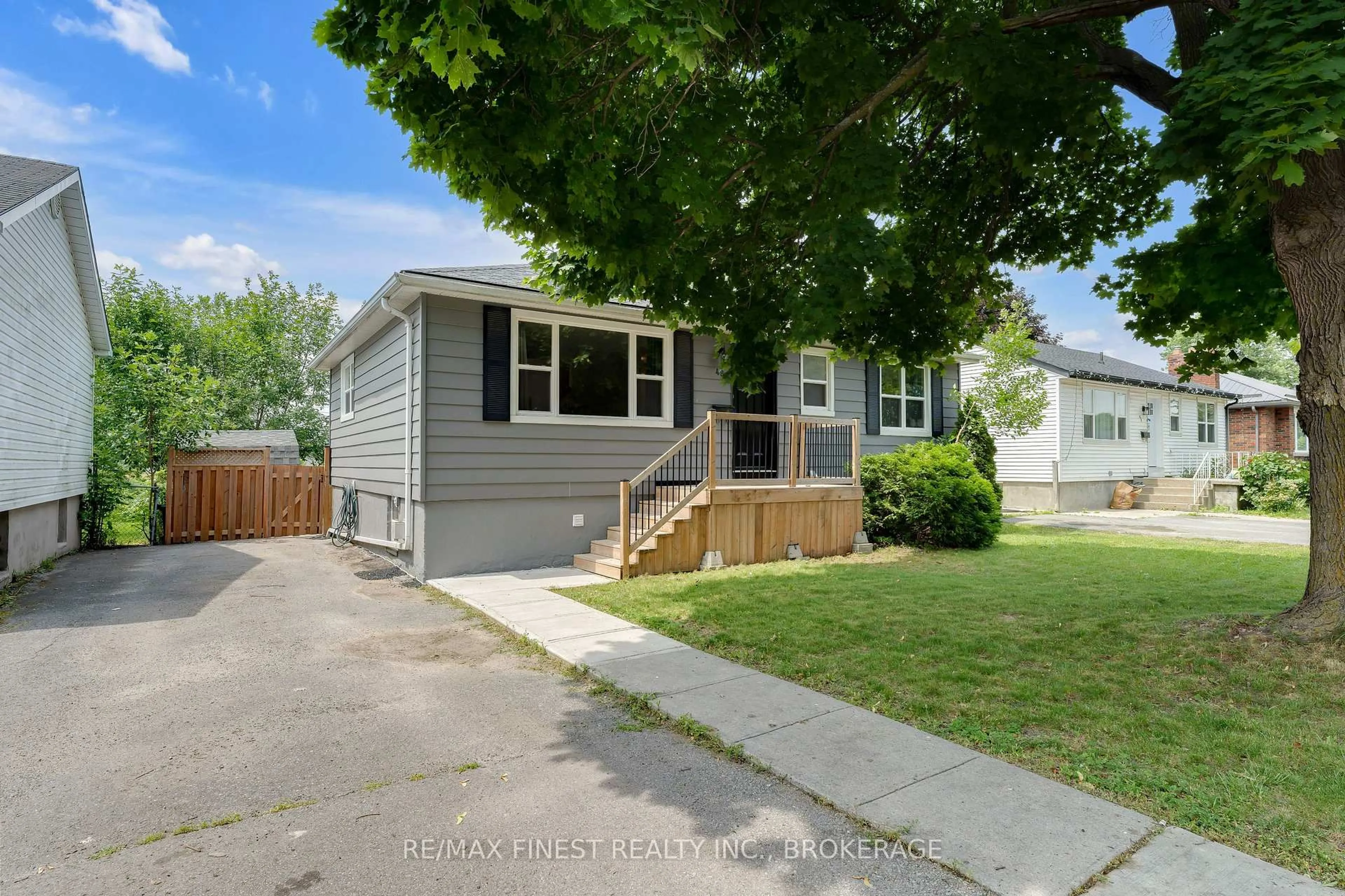 Home with vinyl exterior material, street for 48 Brant St, Kingston Ontario K7K 4V1