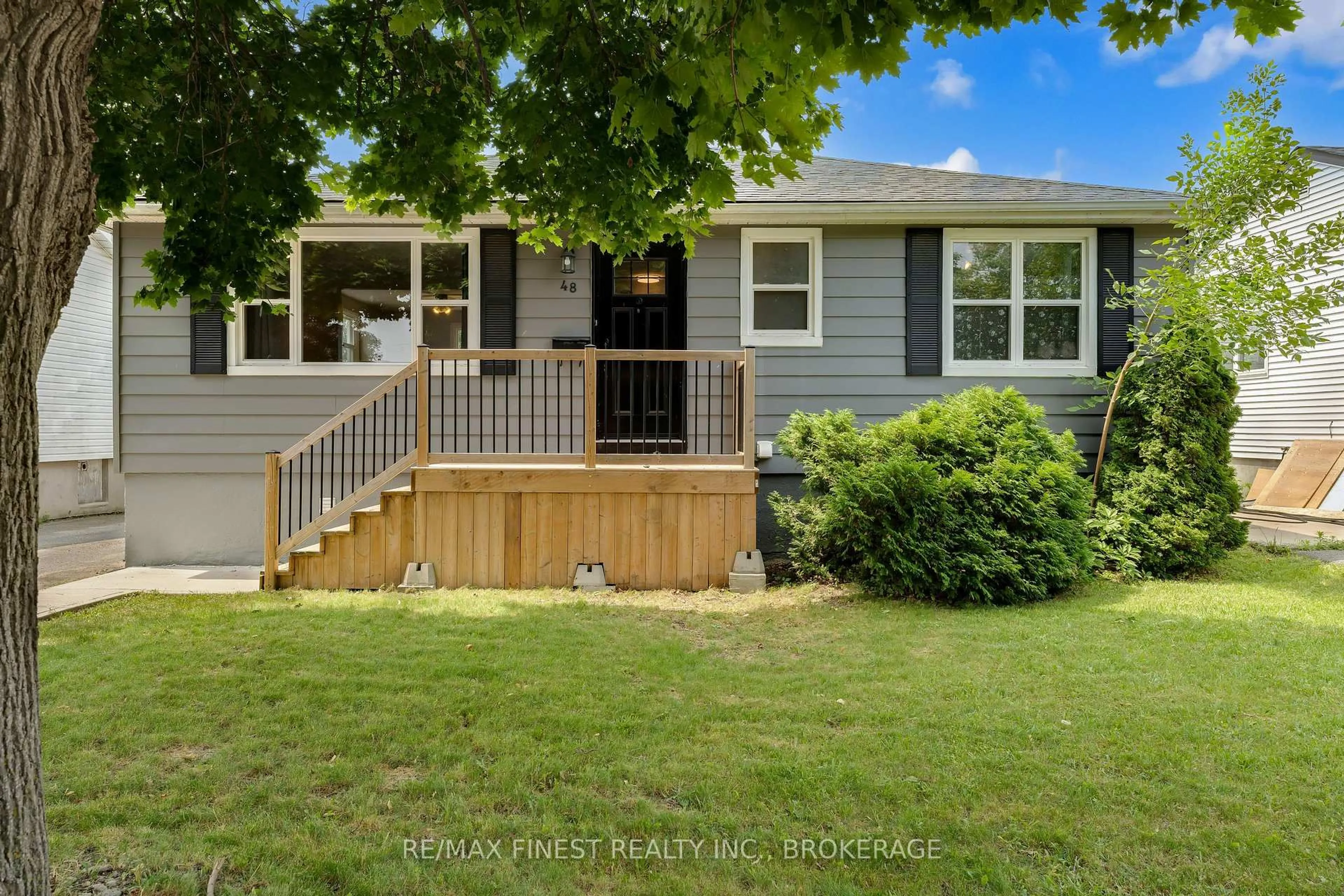 Home with vinyl exterior material, street for 48 Brant St, Kingston Ontario K7K 4V1