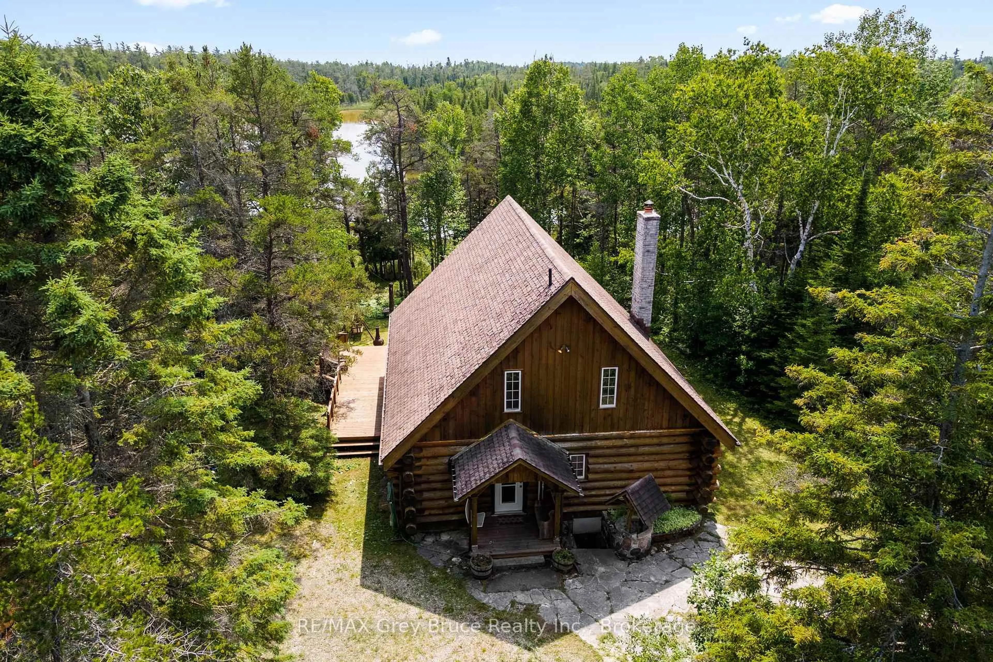 A pic from outside/outdoor area/front of a property/back of a property/a pic from drone, unknown for 12 Scugog Lane, Northern Bruce Peninsula Ontario N0H 2R0