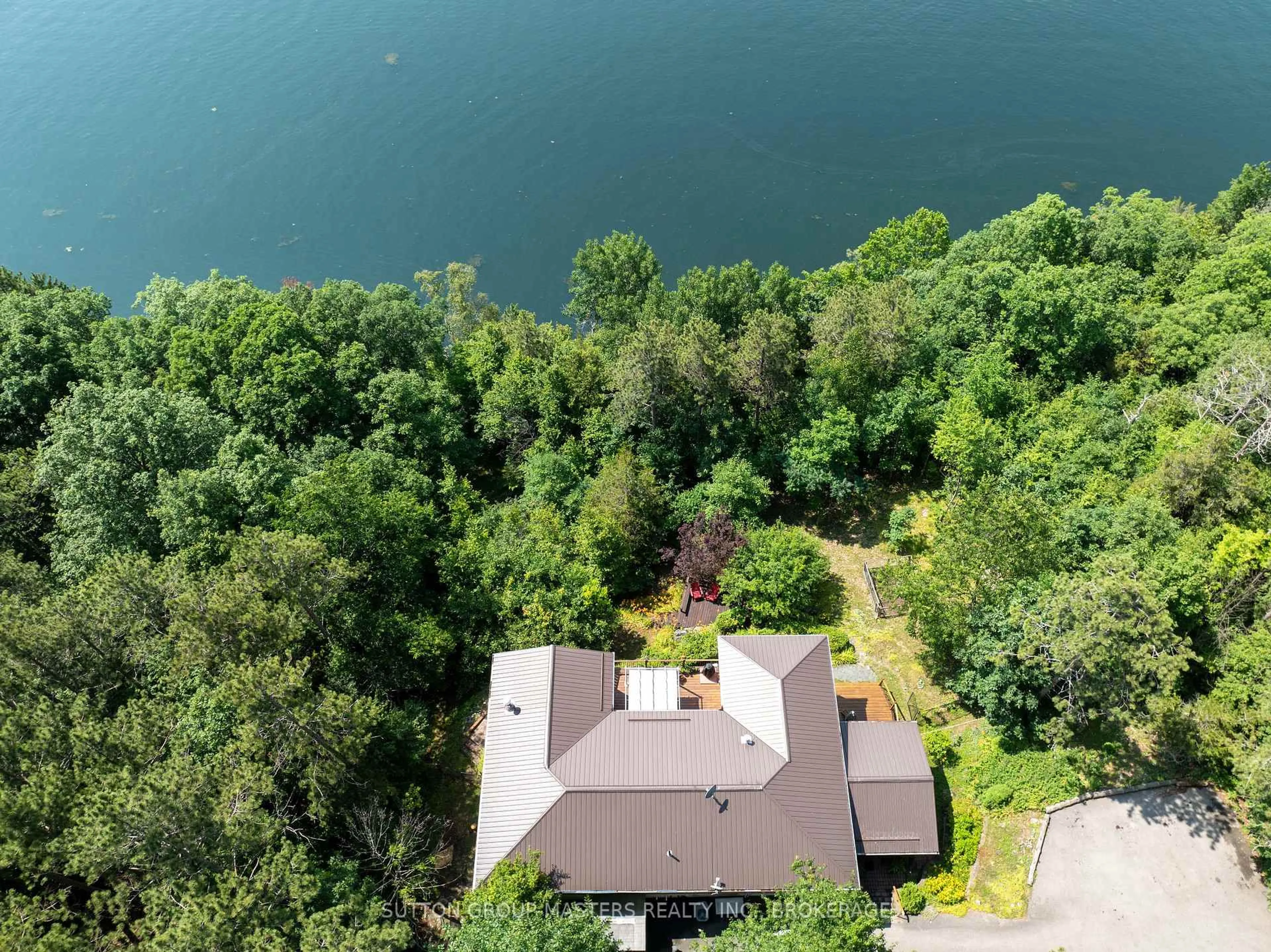 A pic from outside/outdoor area/front of a property/back of a property/a pic from drone, water/lake/river/ocean view for 715 North Shore Rd, Rideau Lakes Ontario K0G 1X0