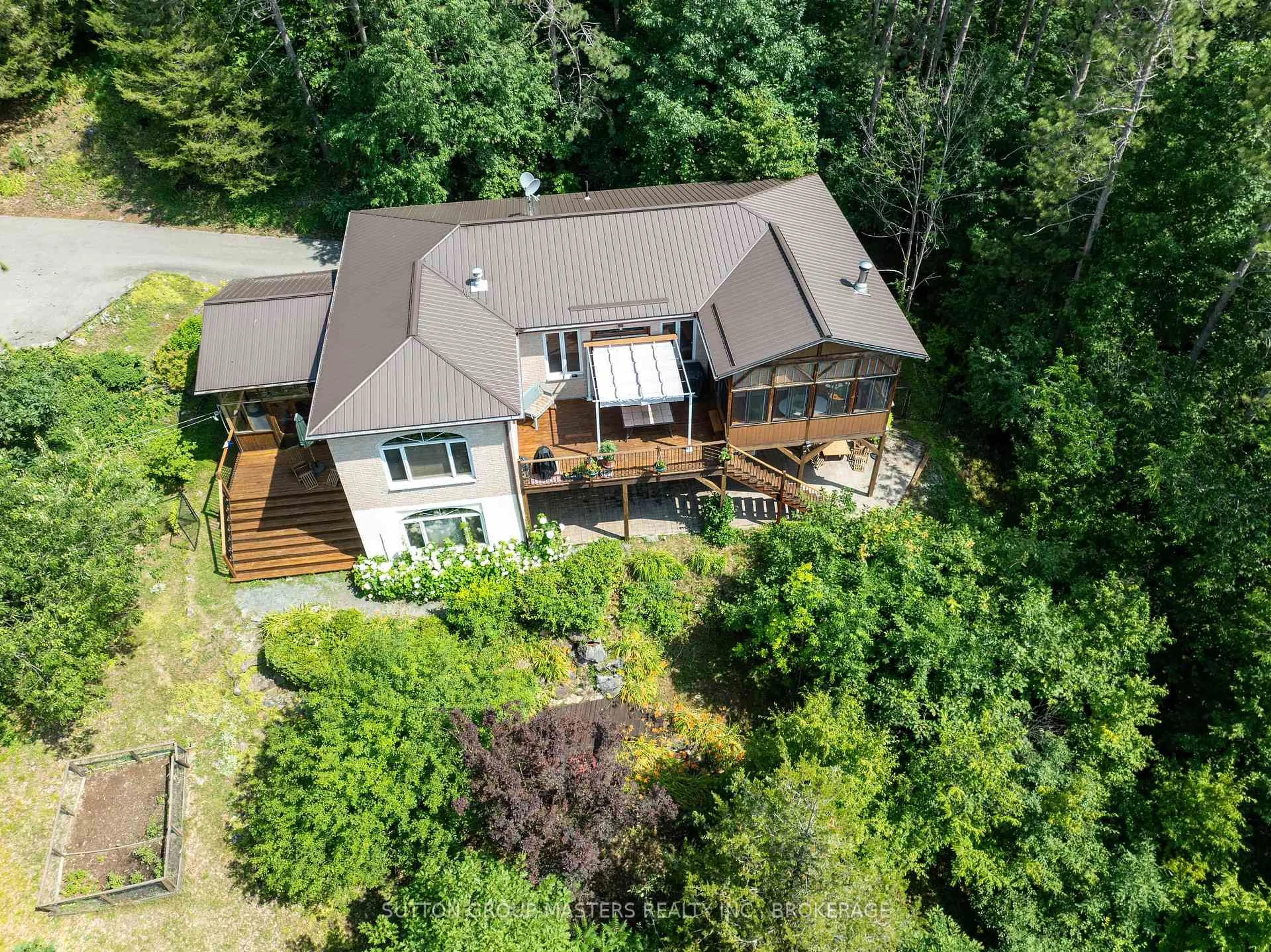A pic from outside/outdoor area/front of a property/back of a property/a pic from drone, unknown for 715 North Shore Rd, Rideau Lakes Ontario K0G 1X0