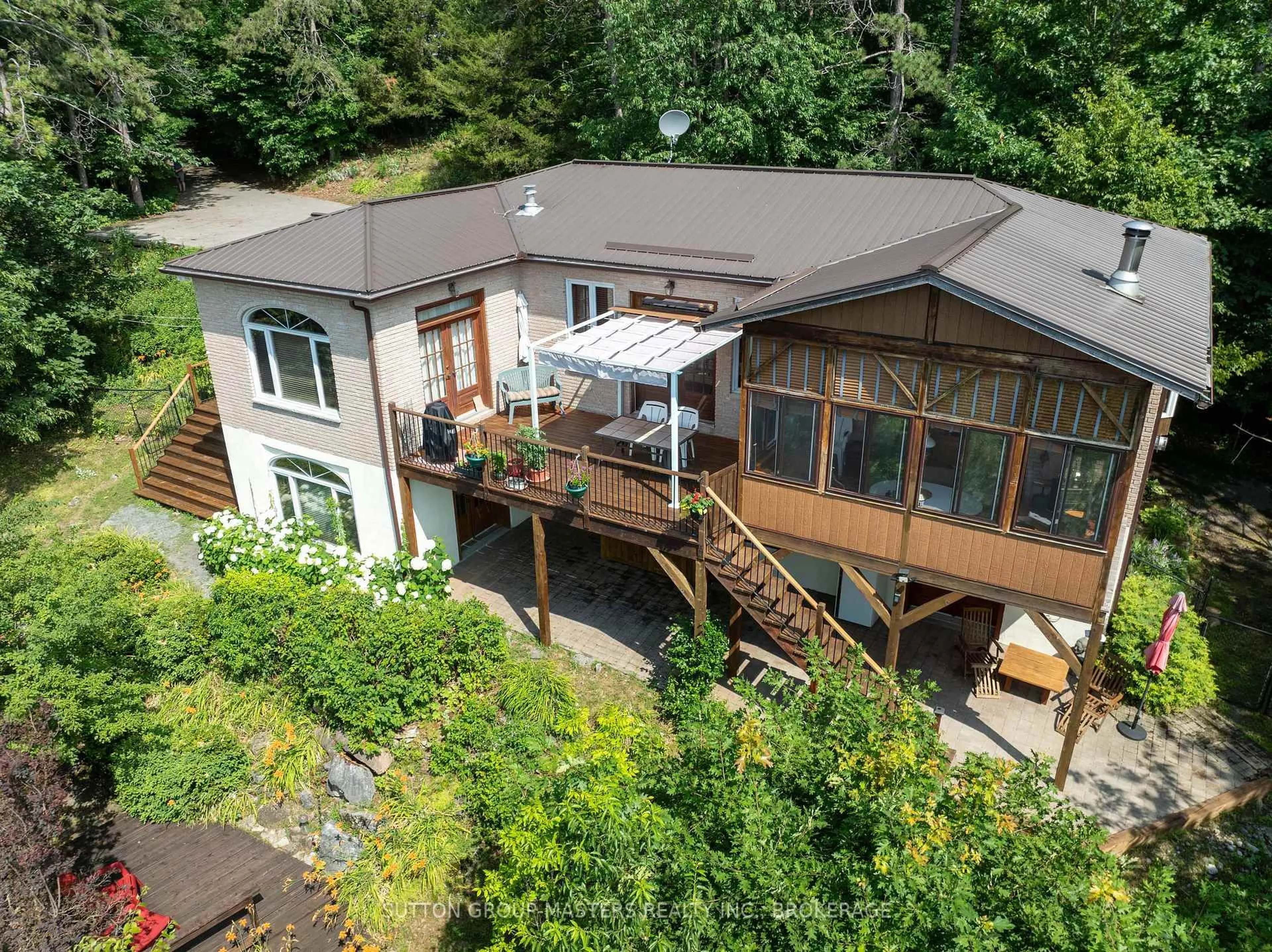 A pic from outside/outdoor area/front of a property/back of a property/a pic from drone, unknown for 715 North Shore Rd, Rideau Lakes Ontario K0G 1X0