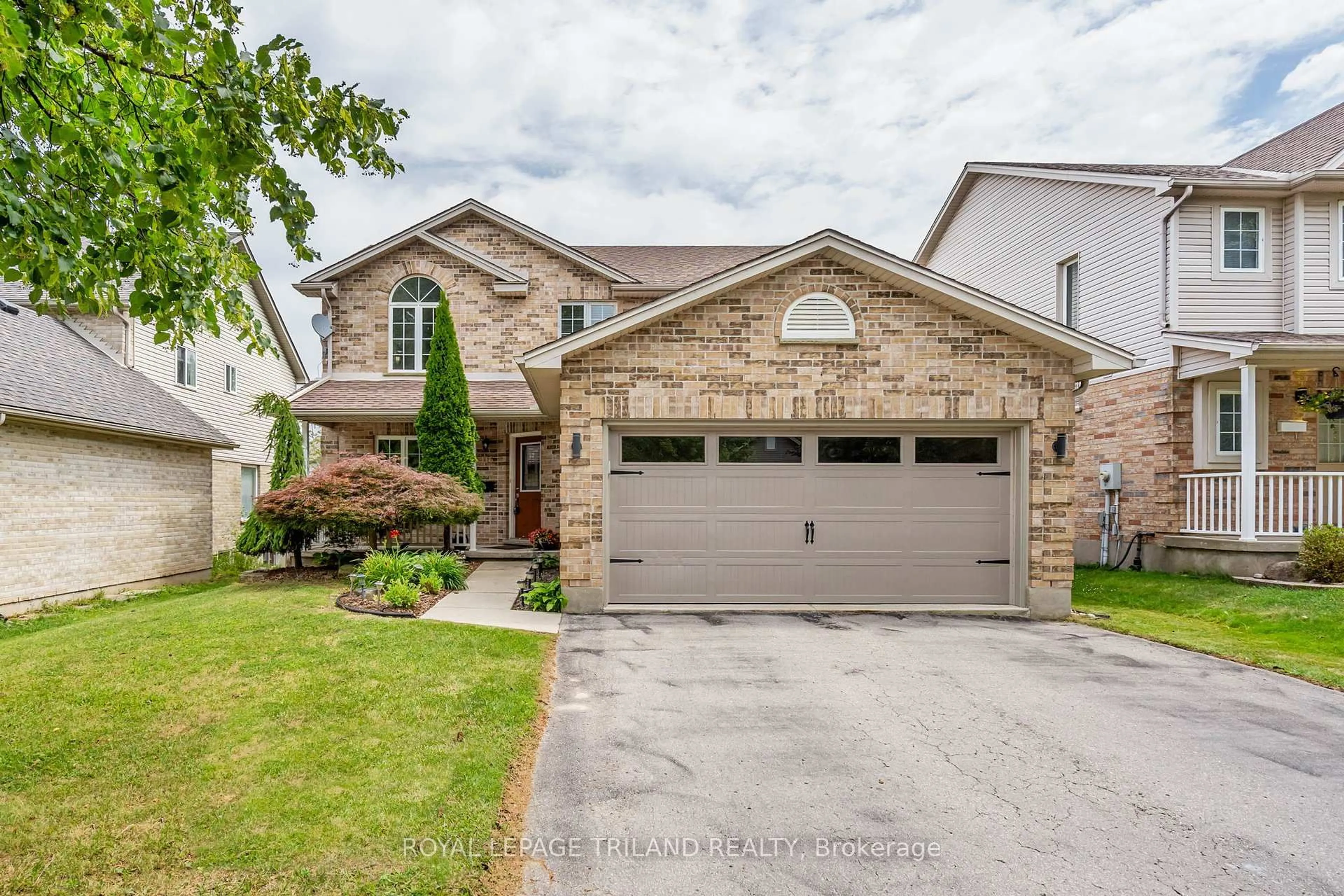 Home with brick exterior material, street for 116 Cedarwood Cres, London North Ontario N6H 5E7