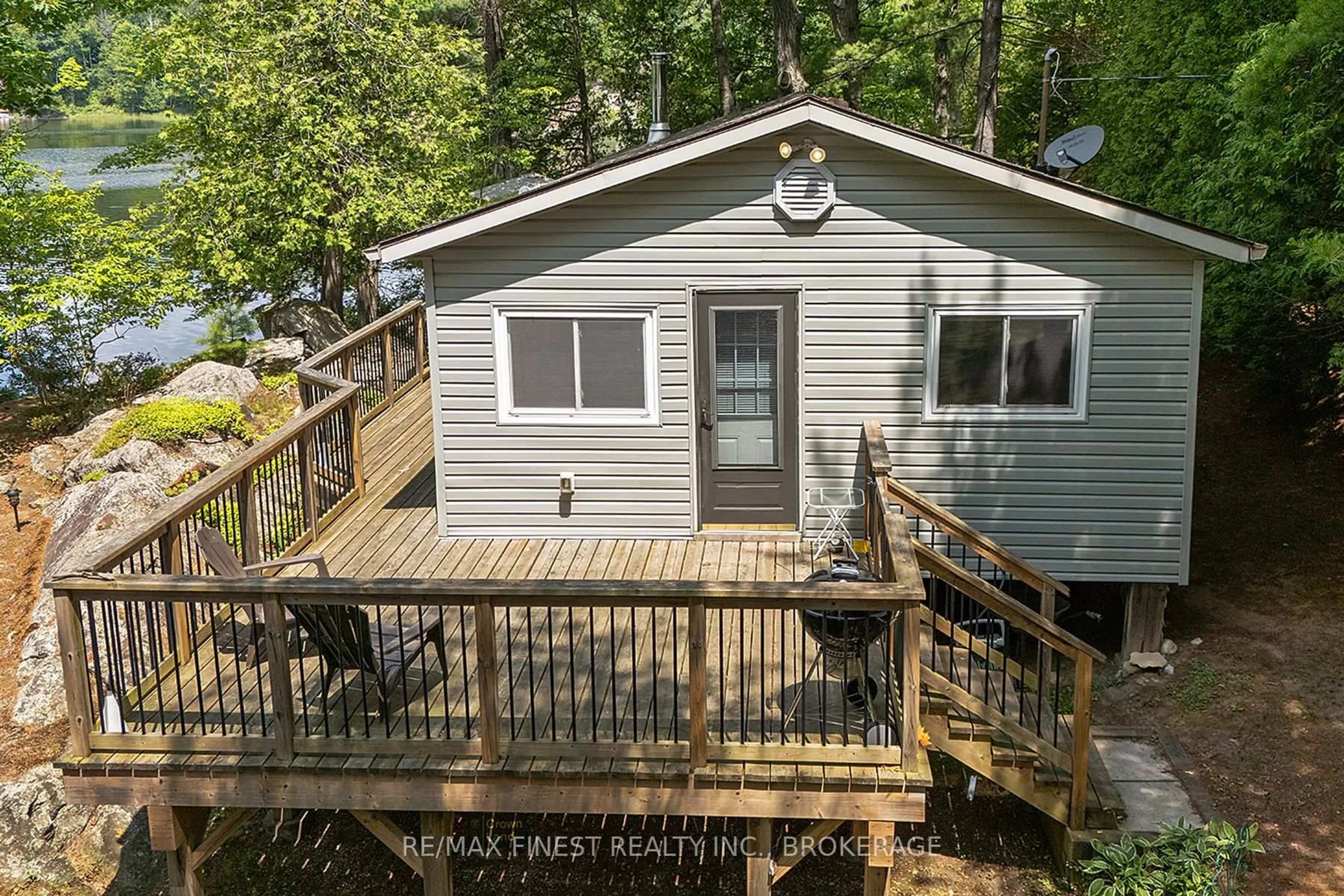 A pic from outside/outdoor area/front of a property/back of a property/a pic from drone, water/lake/river/ocean view for 370A Steve Babcock Lane, Hartington Ontario K0H 1W0