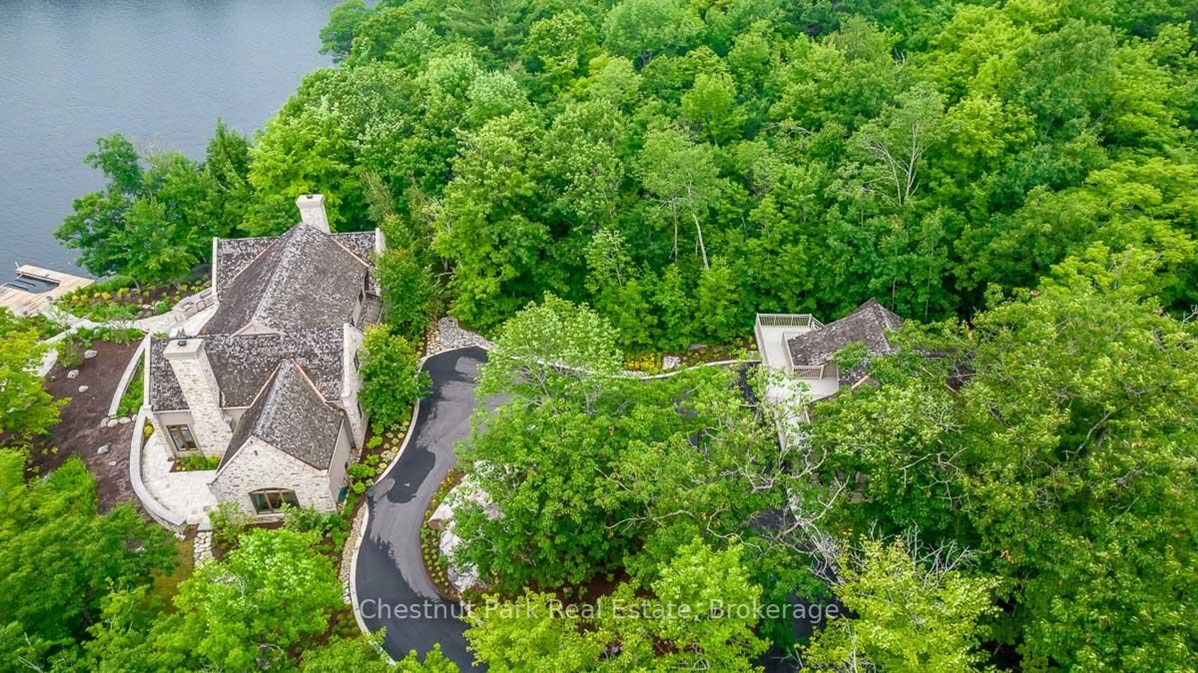 A pic from outside/outdoor area/front of a property/back of a property/a pic from drone, unknown for 4805 Muskoka Road 169 Rd #Unit 3, Muskoka Lakes Ontario P0C 1H0