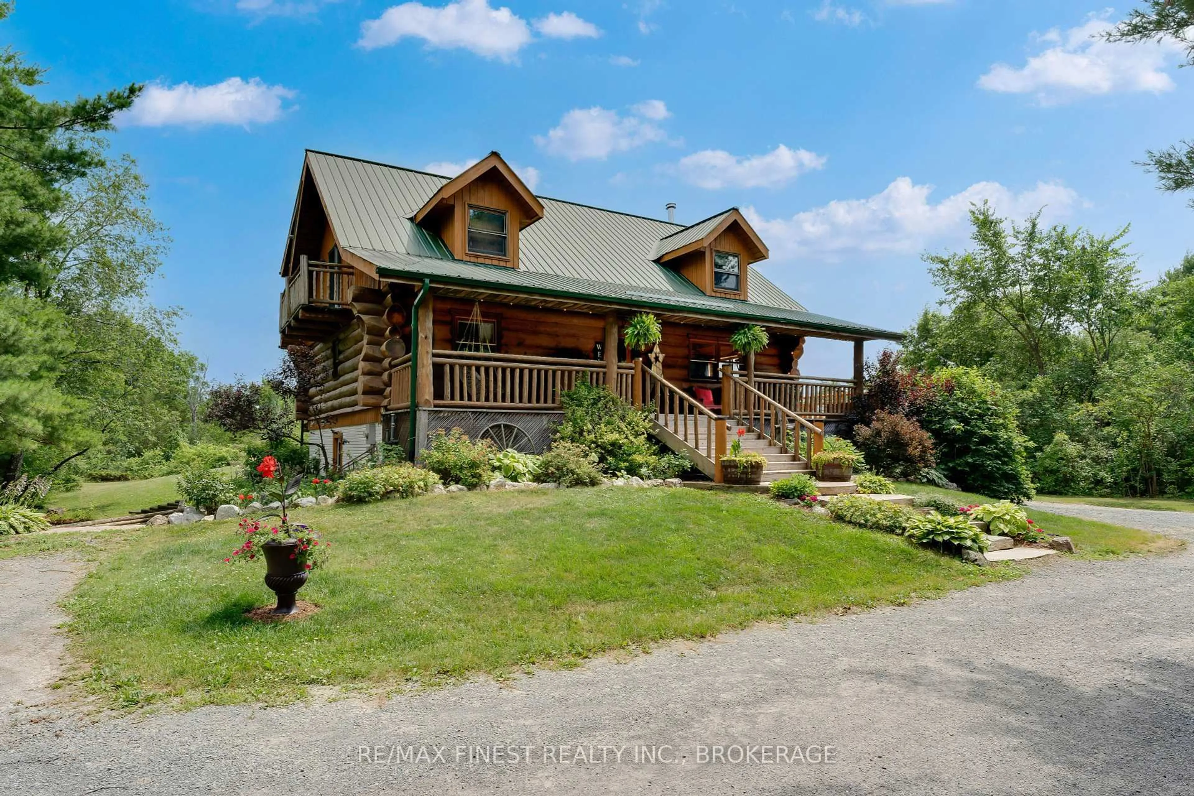 A pic from outside/outdoor area/front of a property/back of a property/a pic from drone, mountain view for 5006 Wallace Rd, Harrowsmith Ontario K0H 1V0