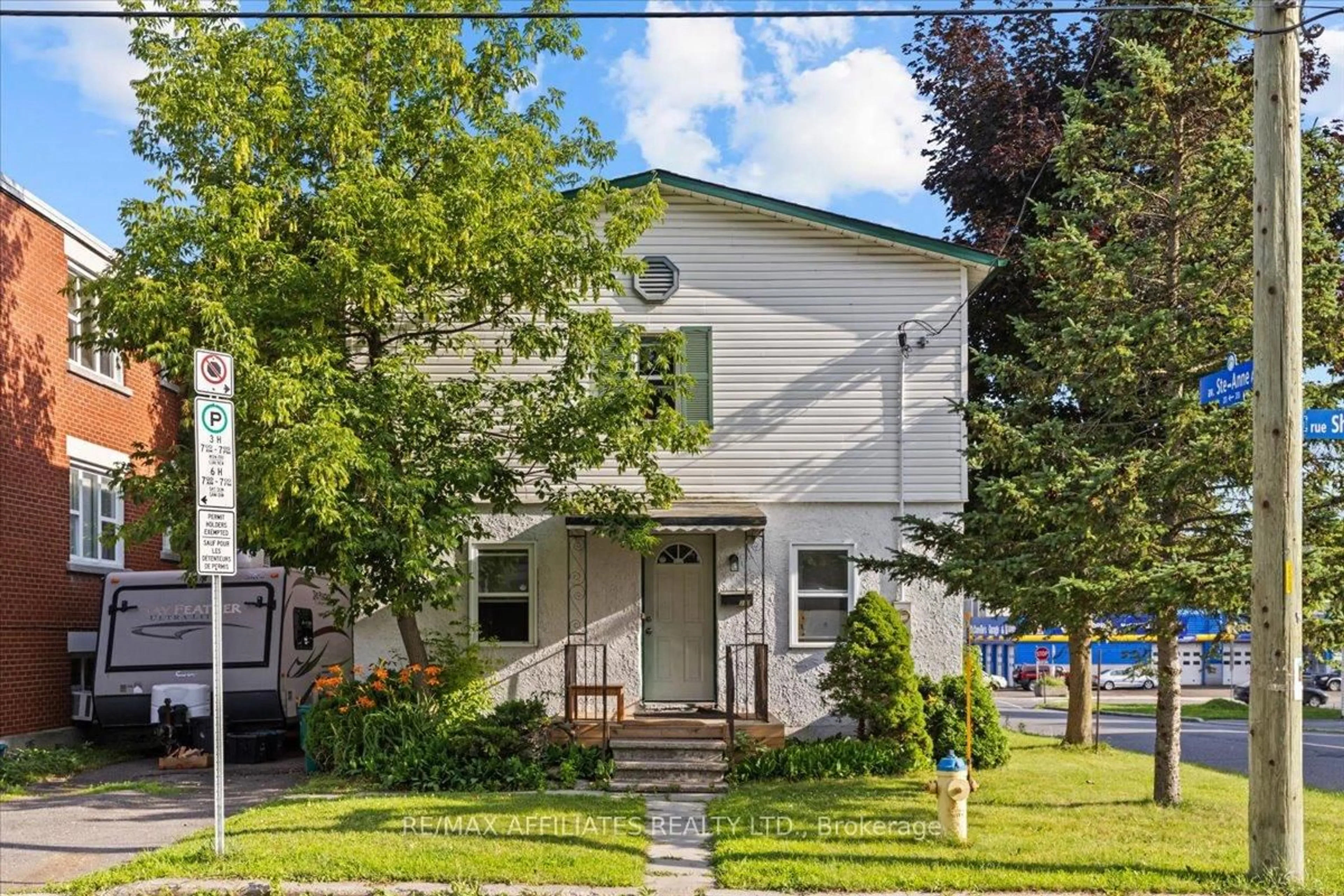 Home with vinyl exterior material, street for 310 Shakespeare St, Ottawa Ontario K1L 5M2