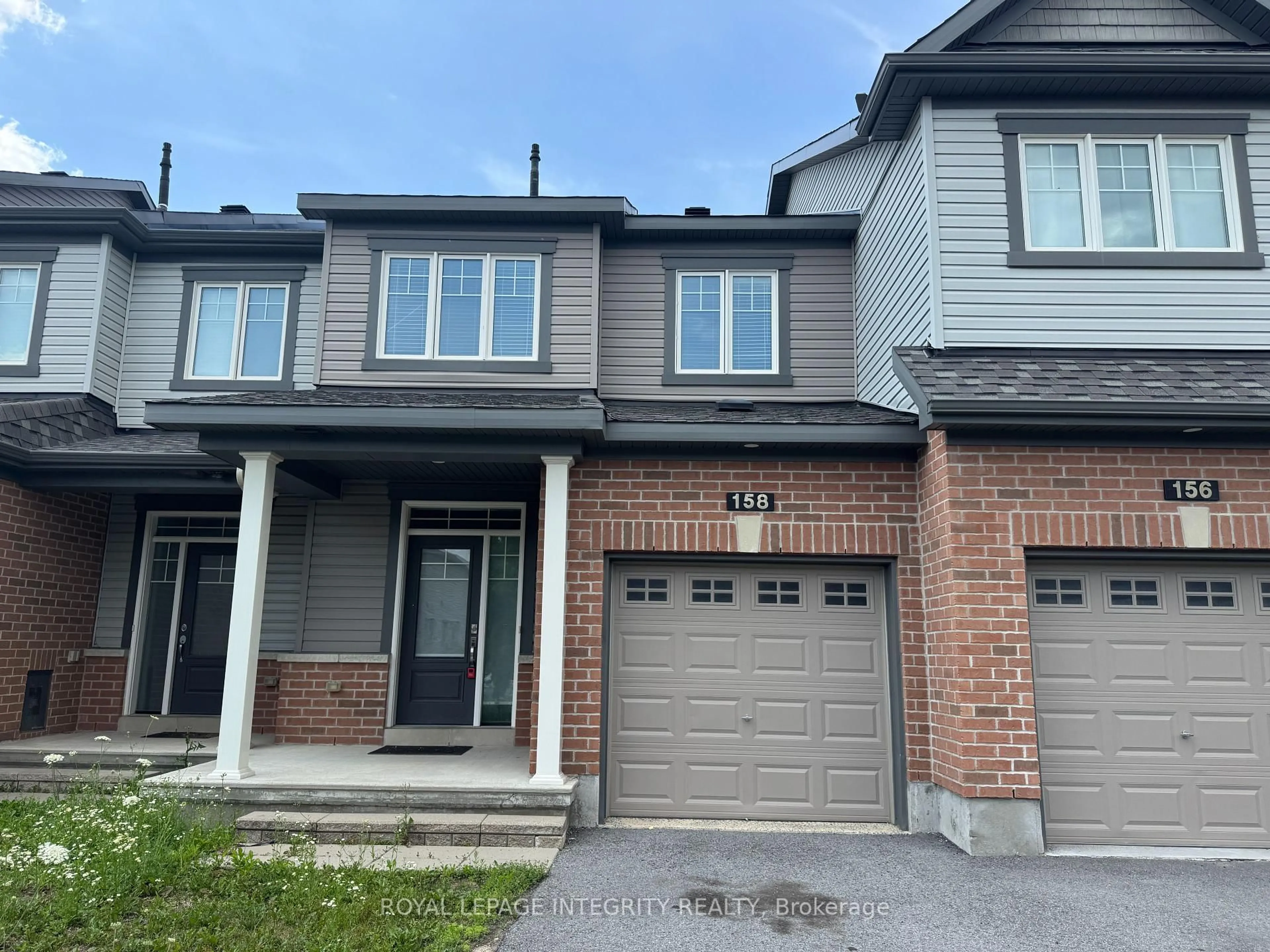 Home with brick exterior material, street for 158 Bandelier Way, Stittsville Ontario K2S 2J6
