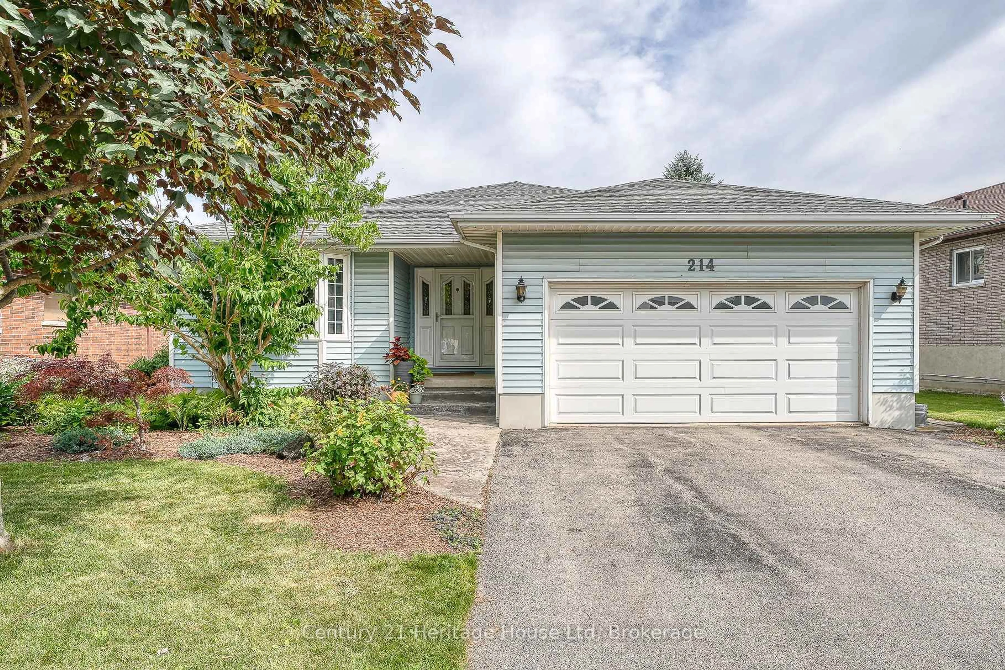 Home with vinyl exterior material, street for 214 John St, Stratford Ontario N5A 7T3