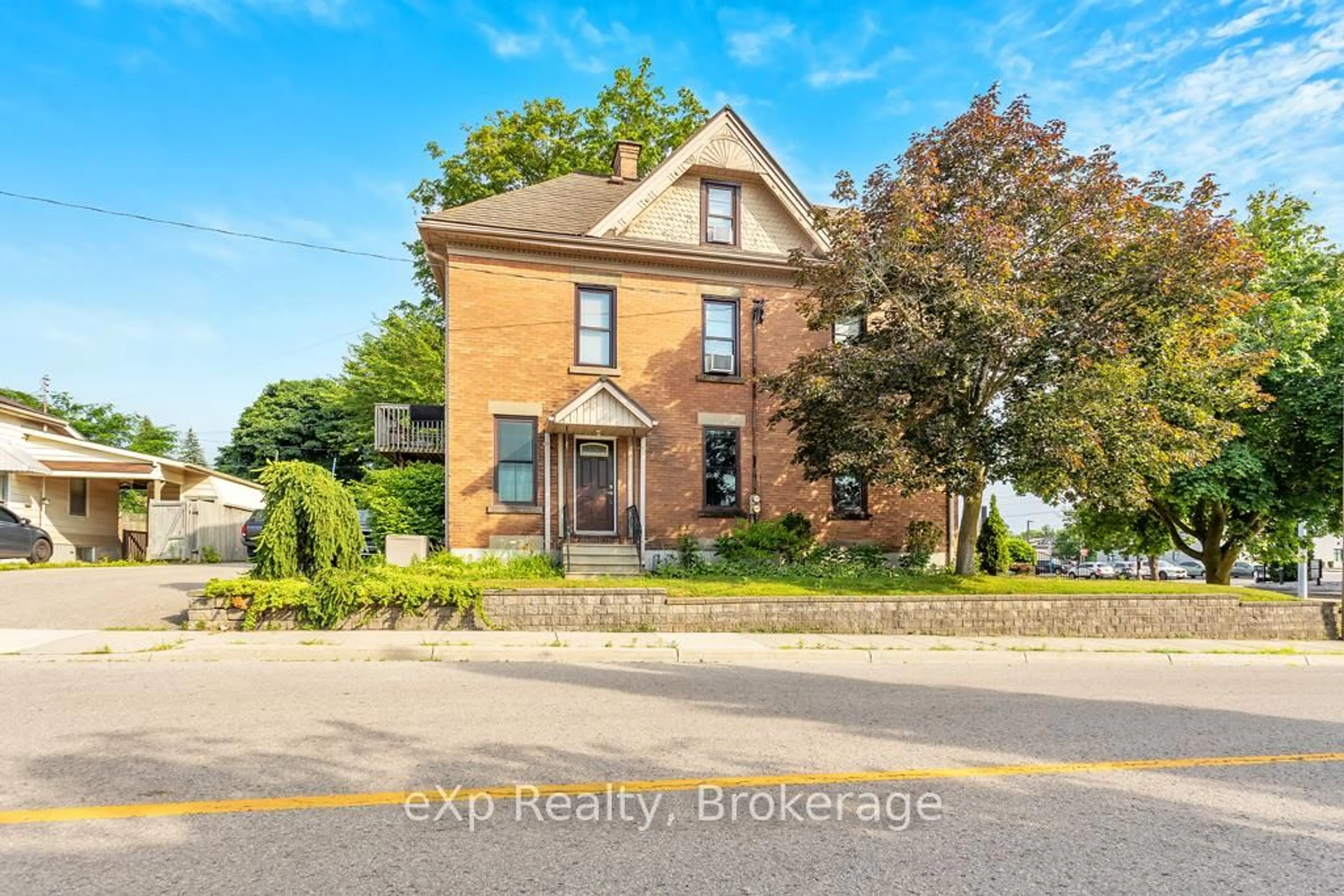 Home with brick exterior material, street for 22 Harvey St, Tillsonburg Ontario N4G 3J6