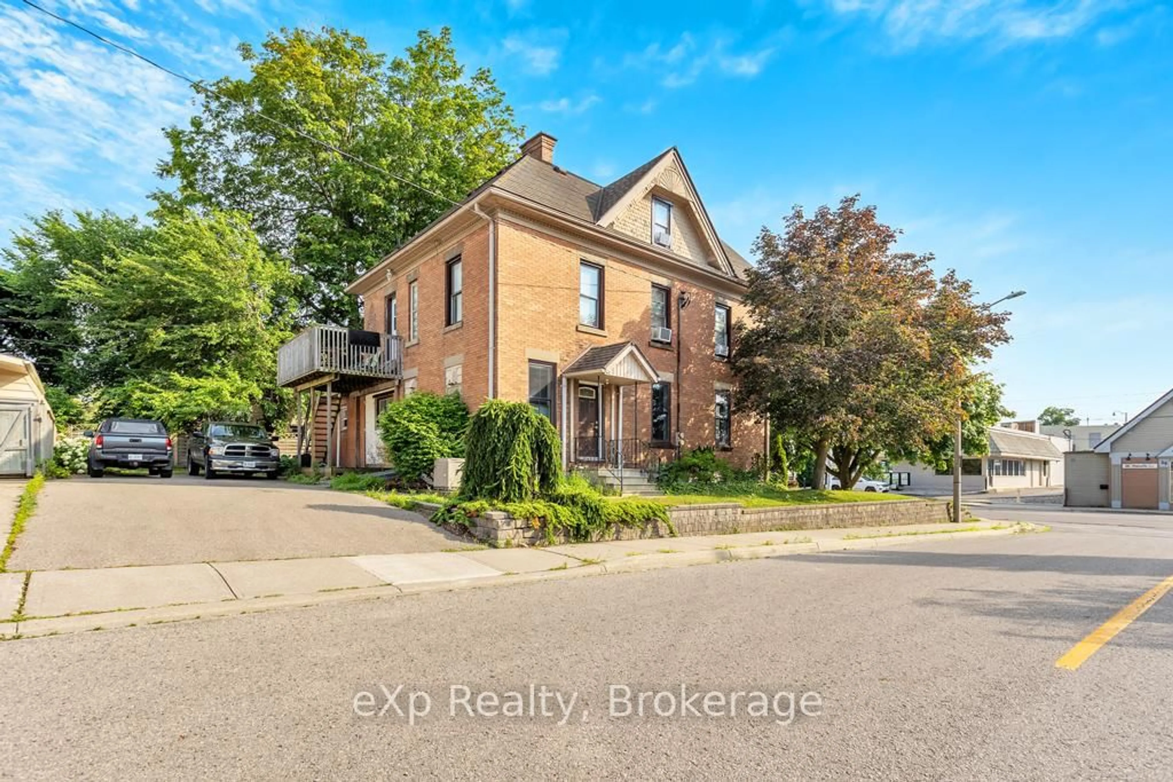 Home with brick exterior material, street for 22 Harvey St, Tillsonburg Ontario N4G 3J6