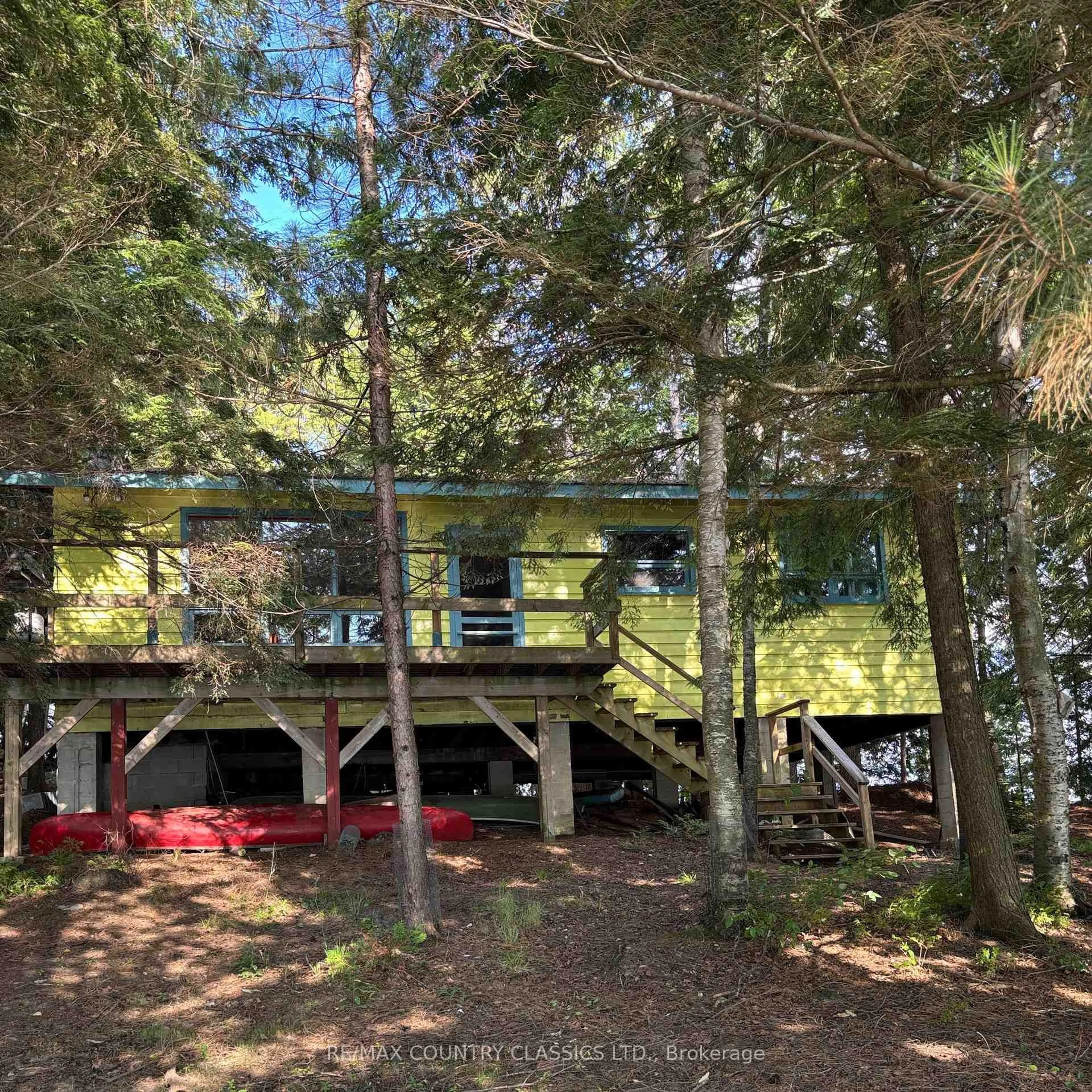 A pic from outside/outdoor area/front of a property/back of a property/a pic from drone, forest/trees view for 15500 Moulds Island, Highlands East Ontario K0L 1C0