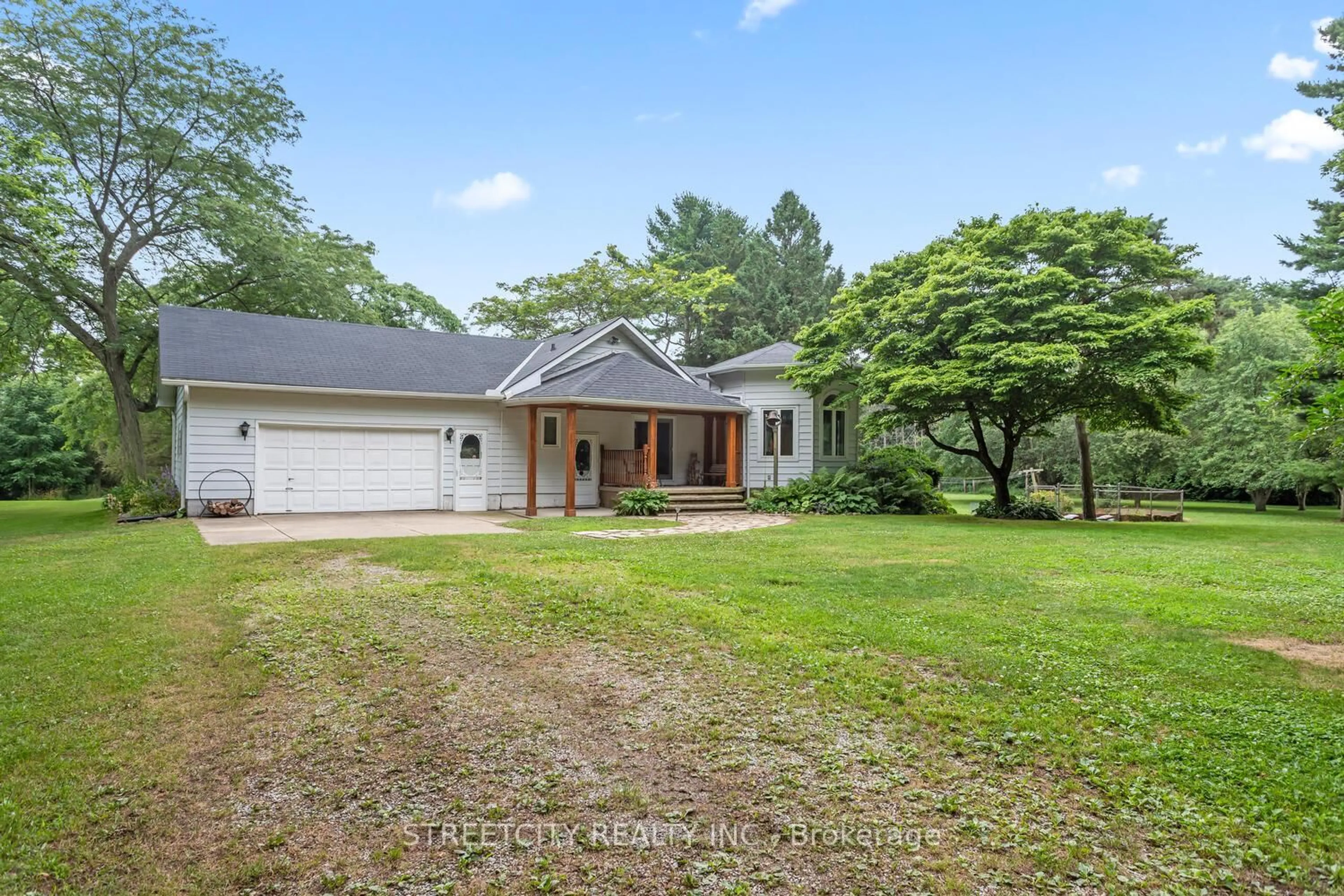 A pic from outside/outdoor area/front of a property/back of a property/a pic from drone, water/lake/river/ocean view for 18725 Desmond Rd, Chatham-Kent Ontario N0P 2C0