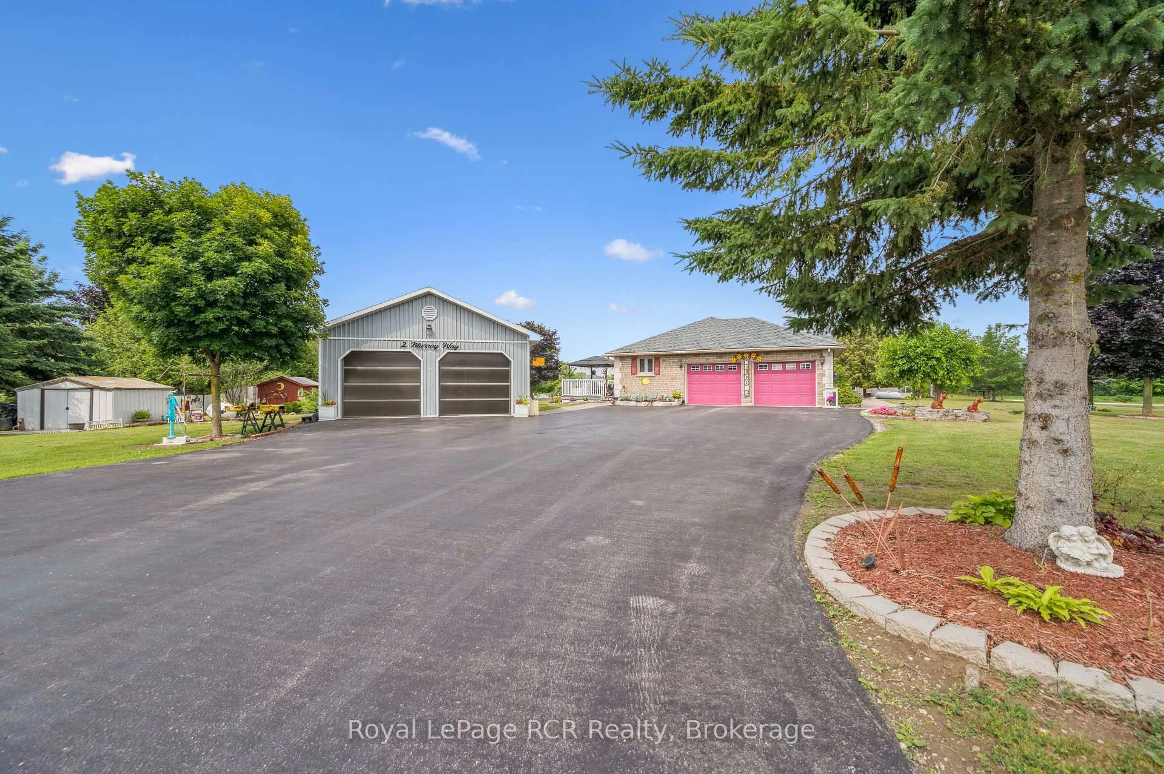 A pic from outside/outdoor area/front of a property/back of a property/a pic from drone, street for 2 Murray Way, Minto Ontario N0G 2L0
