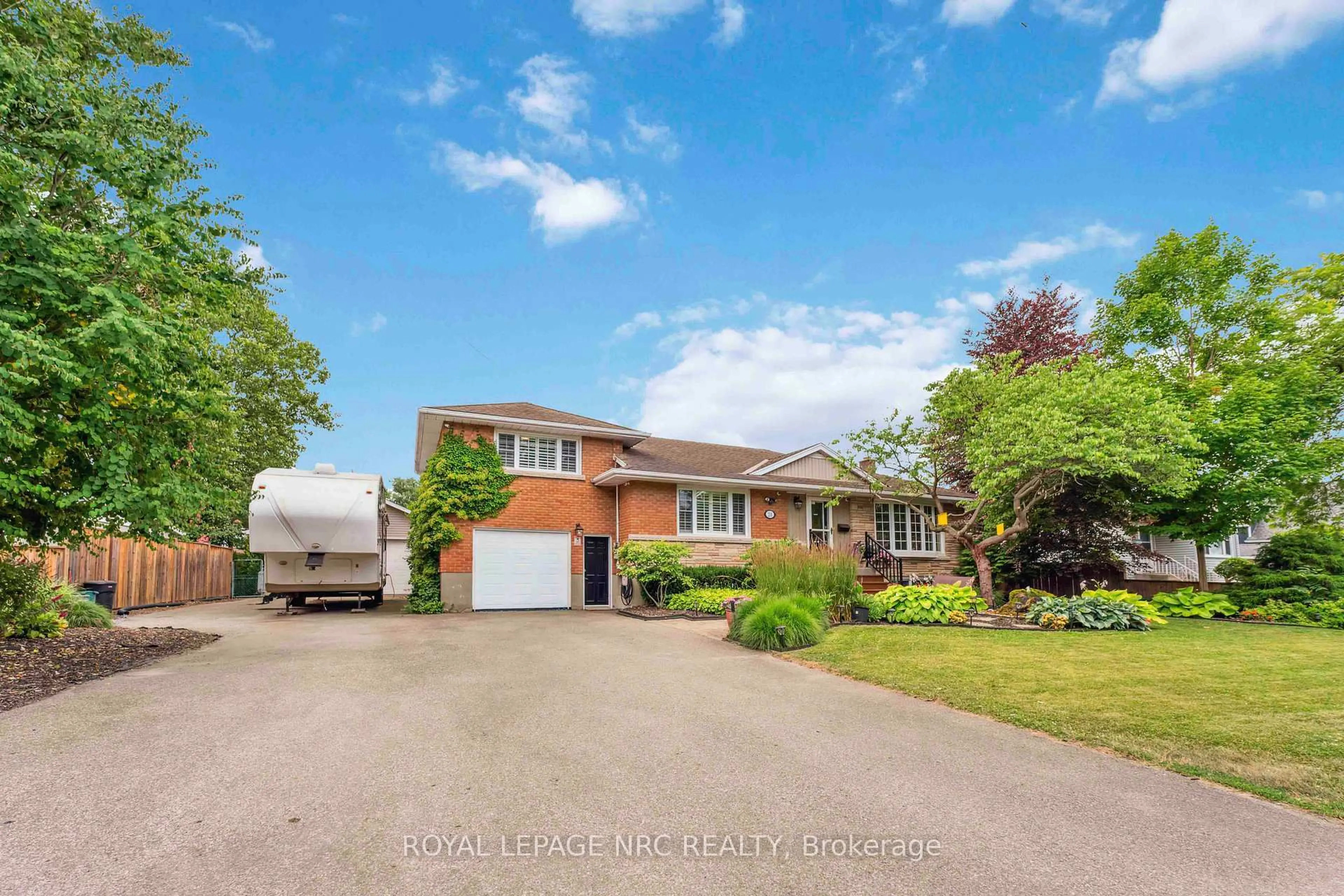 Home with brick exterior material, street for 24 Northdale Dr, St. Catharines Ontario L2M 3N7