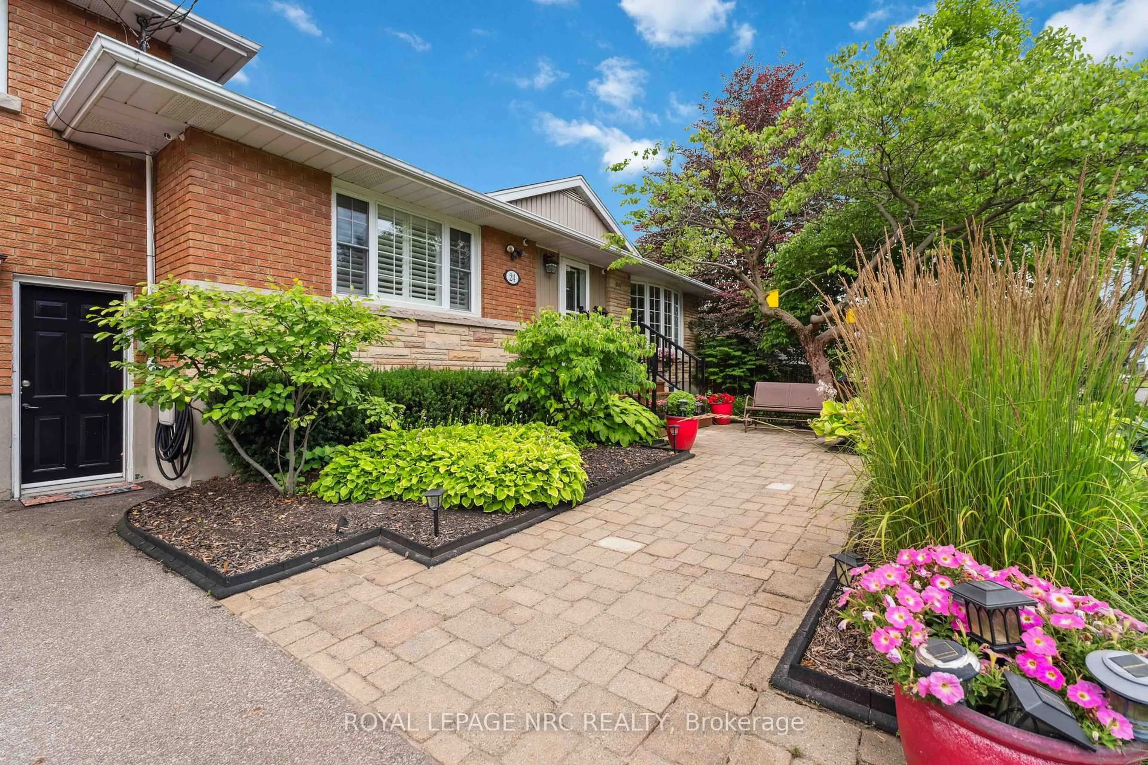 Home with brick exterior material, street for 24 Northdale Dr, St. Catharines Ontario L2M 3N7