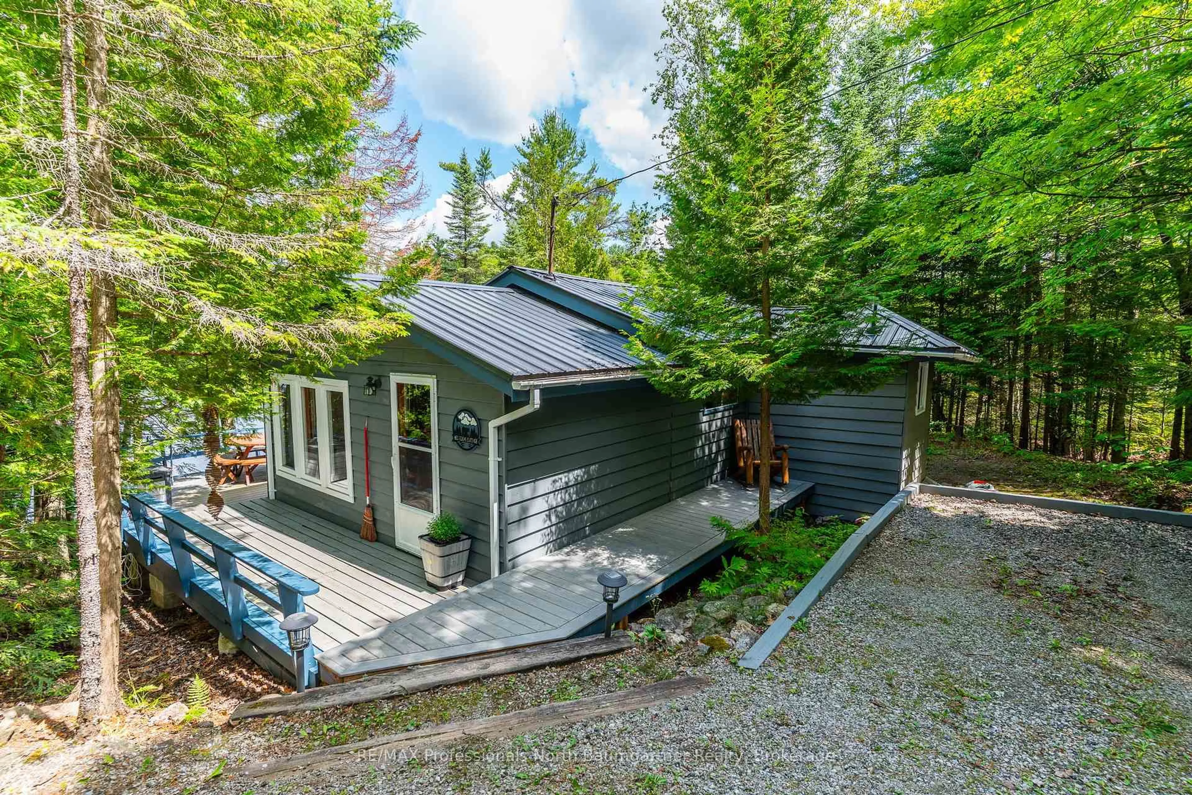 A pic from outside/outdoor area/front of a property/back of a property/a pic from drone, unknown for 1068 Wolverine Dr, Highlands East Ontario K0M 1S0