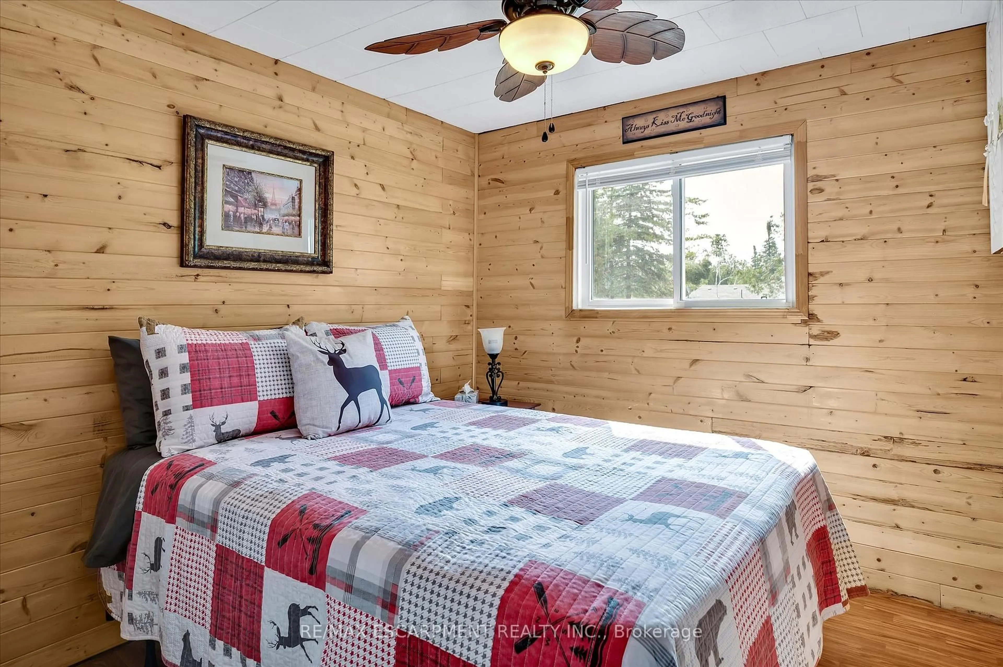 Bedroom with bed, wood/laminate floor for 38 FIRE ROUTE 104A, Trent Lakes Ontario K0M 1A0