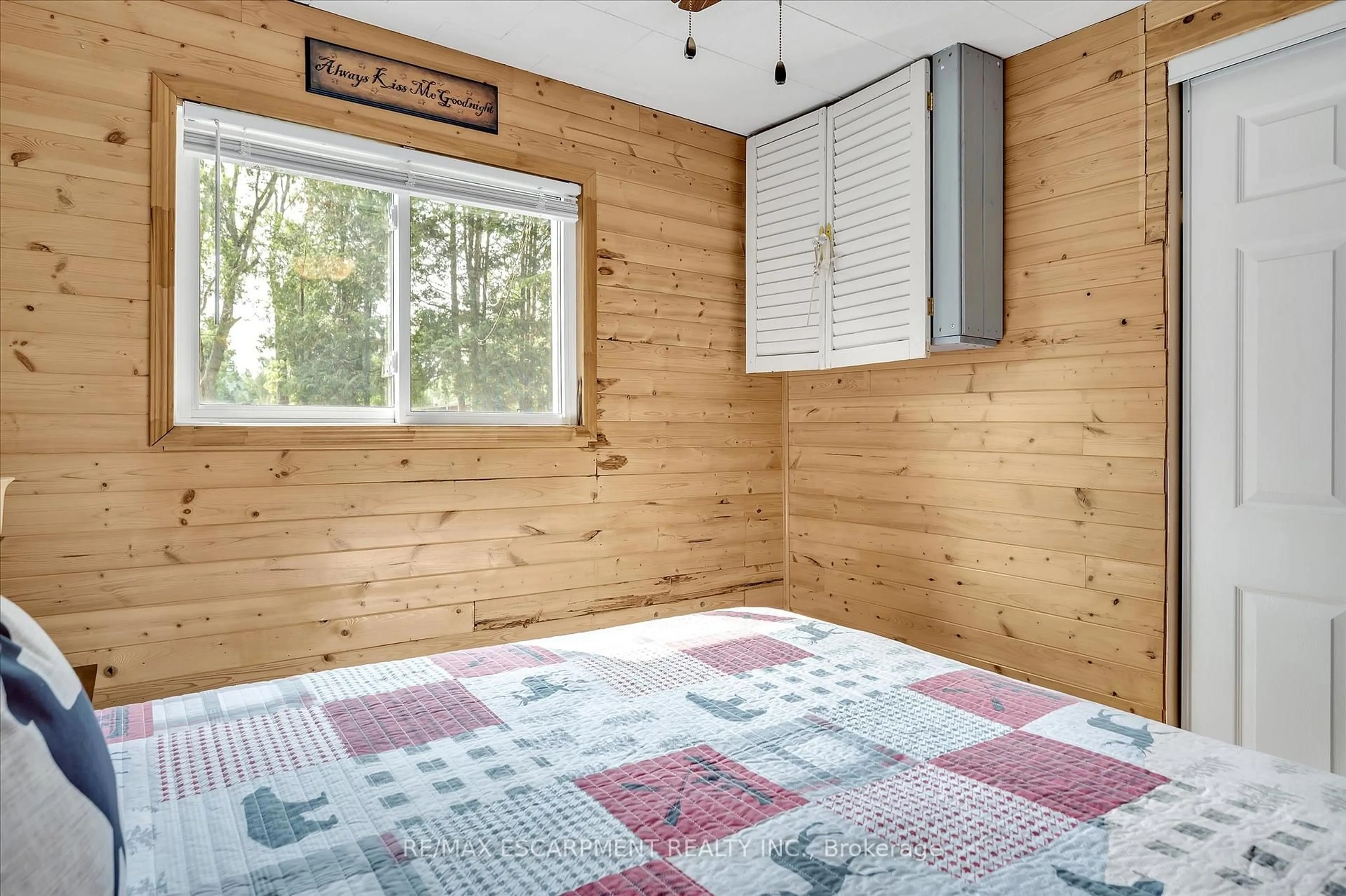 Bedroom with bed, wood/laminate floor for 38 FIRE ROUTE 104A, Trent Lakes Ontario K0M 1A0