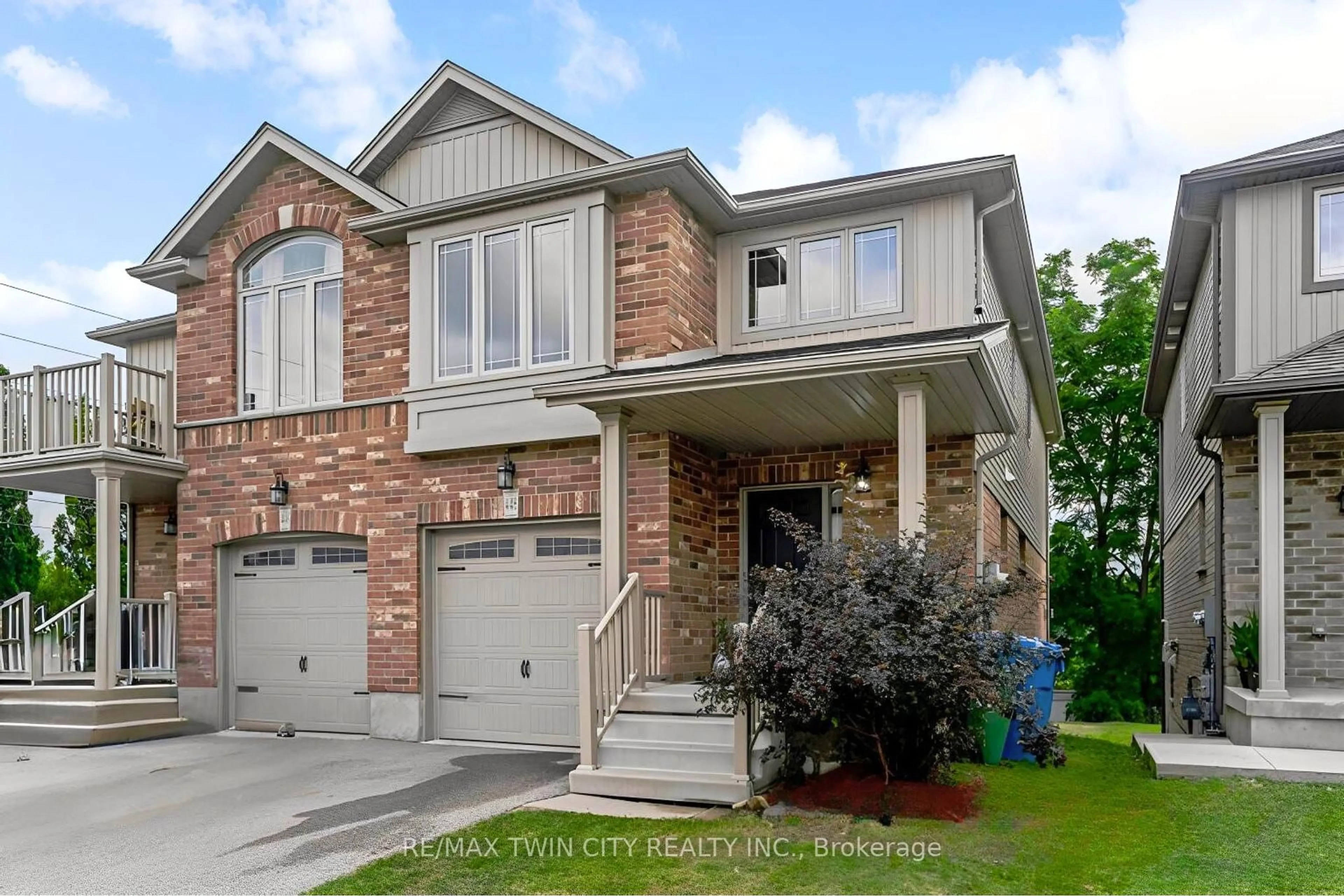 Home with brick exterior material, street for 448 Starwood Dr, Guelph Ontario N1E 6X2