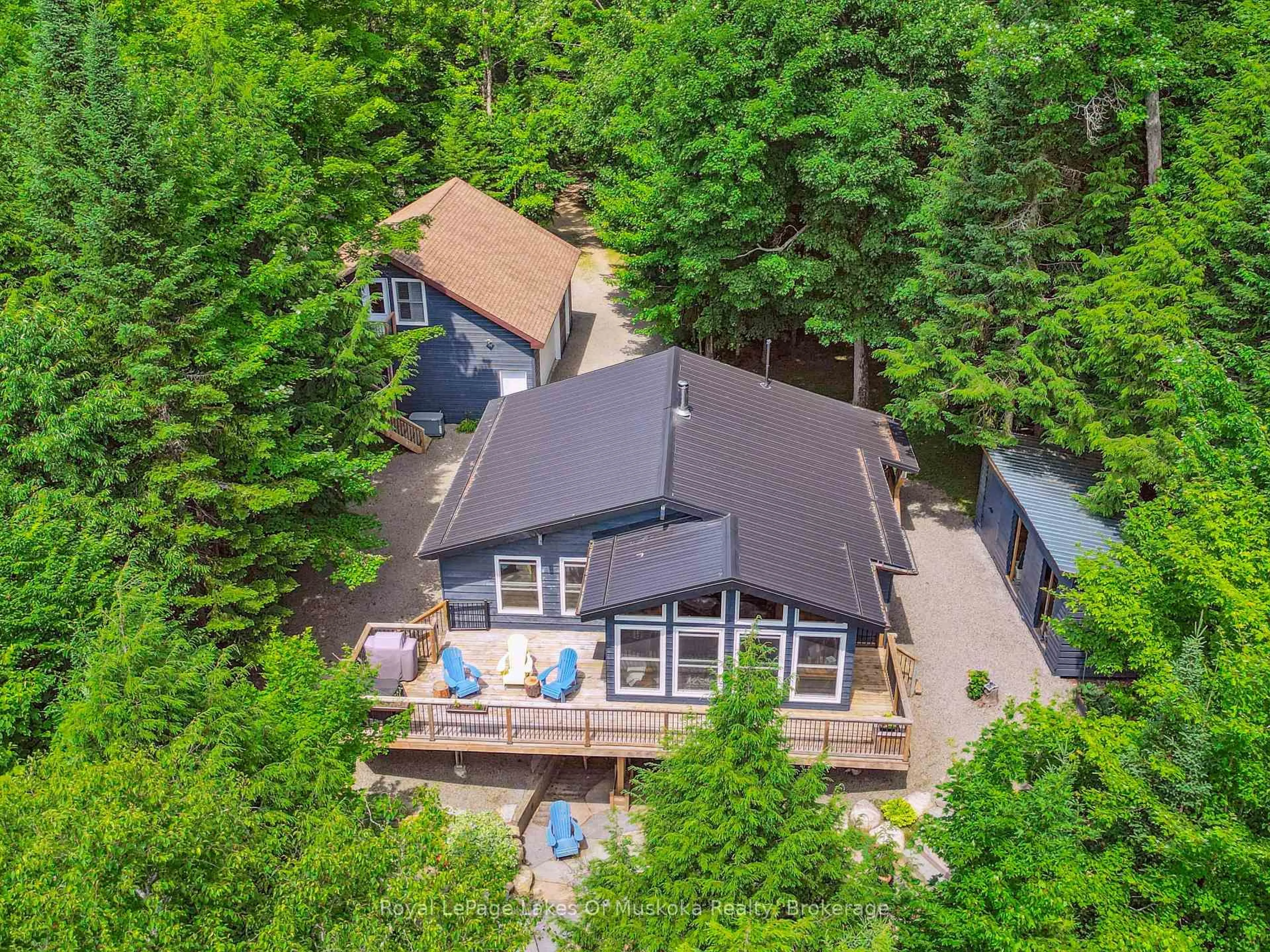 A pic from outside/outdoor area/front of a property/back of a property/a pic from drone, unknown for 1315 Wolf Circ, Algonquin Highlands Ontario P0A 1E0