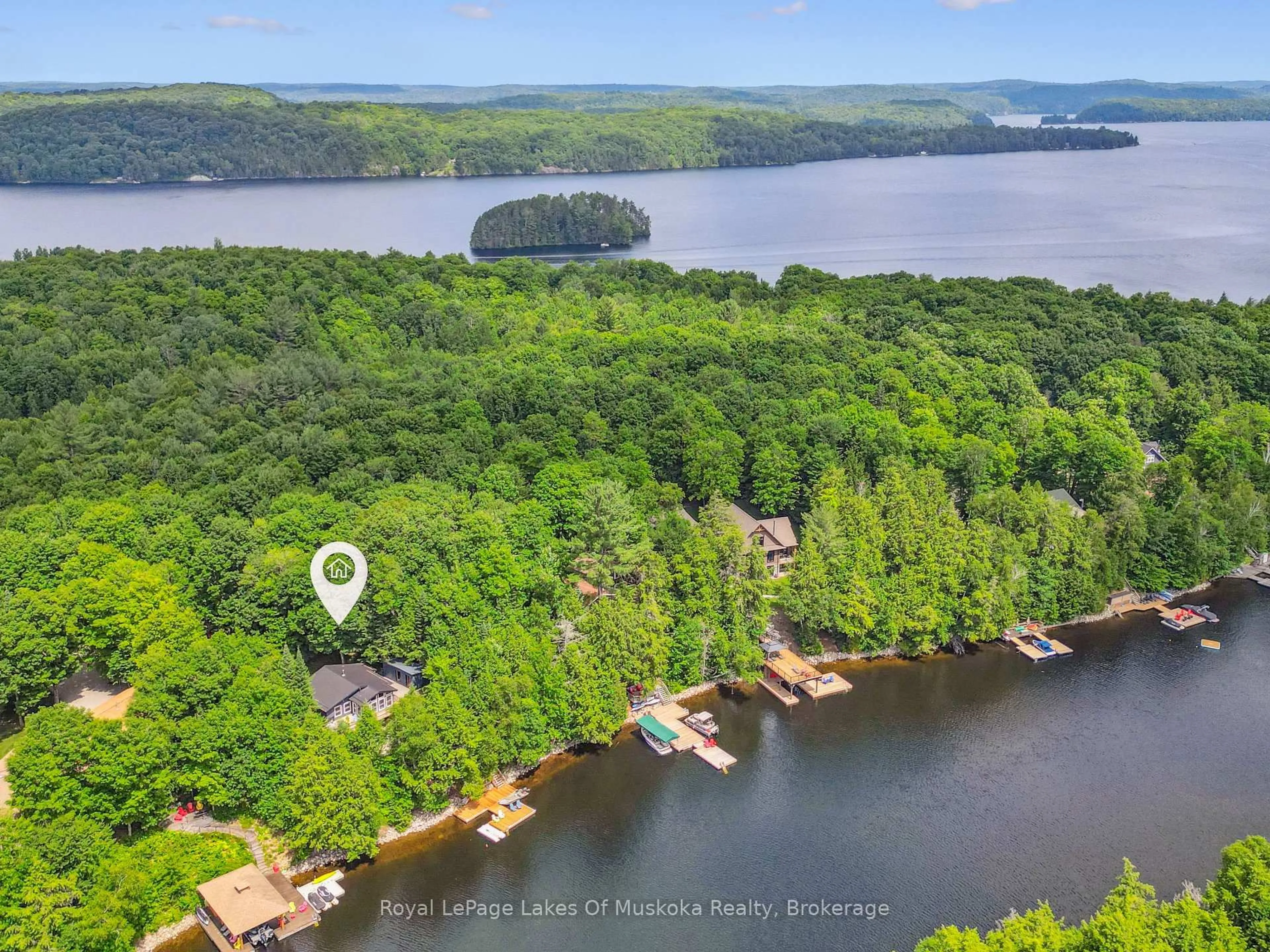 A pic from outside/outdoor area/front of a property/back of a property/a pic from drone, water/lake/river/ocean view for 1315 Wolf Circ, Algonquin Highlands Ontario P0A 1E0