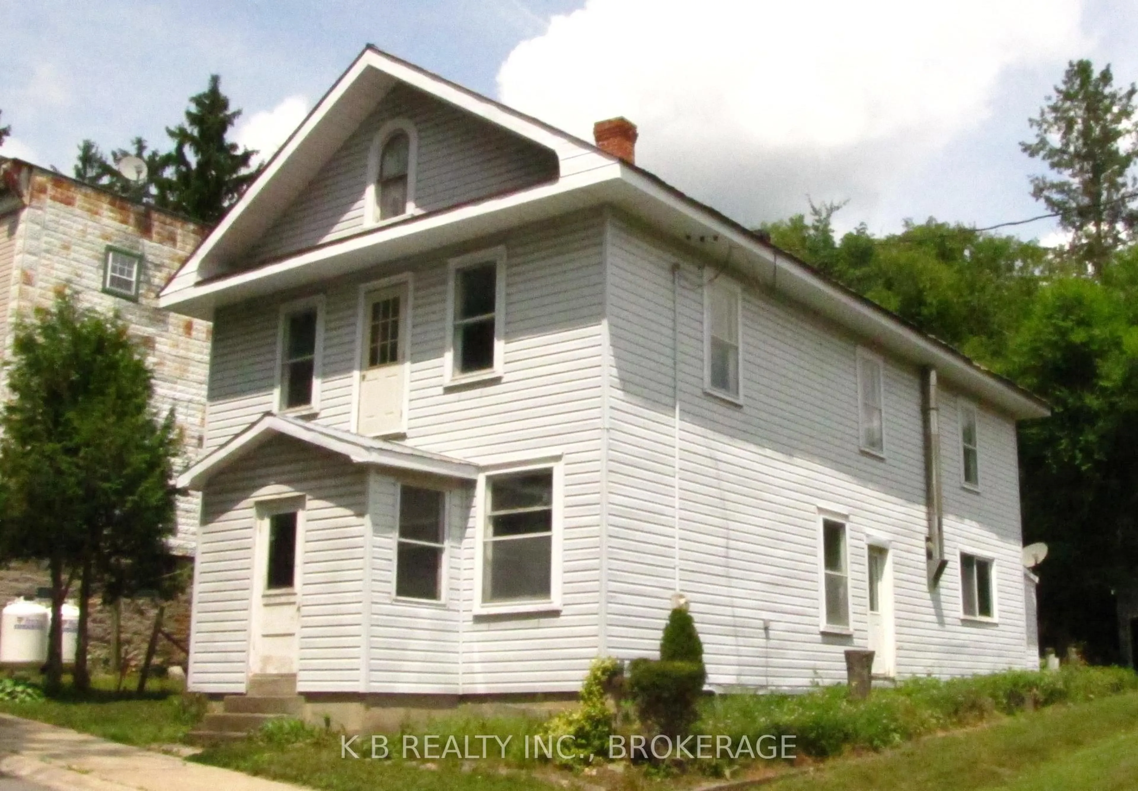 Home with vinyl exterior material, building for 1033 Bridge St, Stone Mills Ontario K0K 2A0