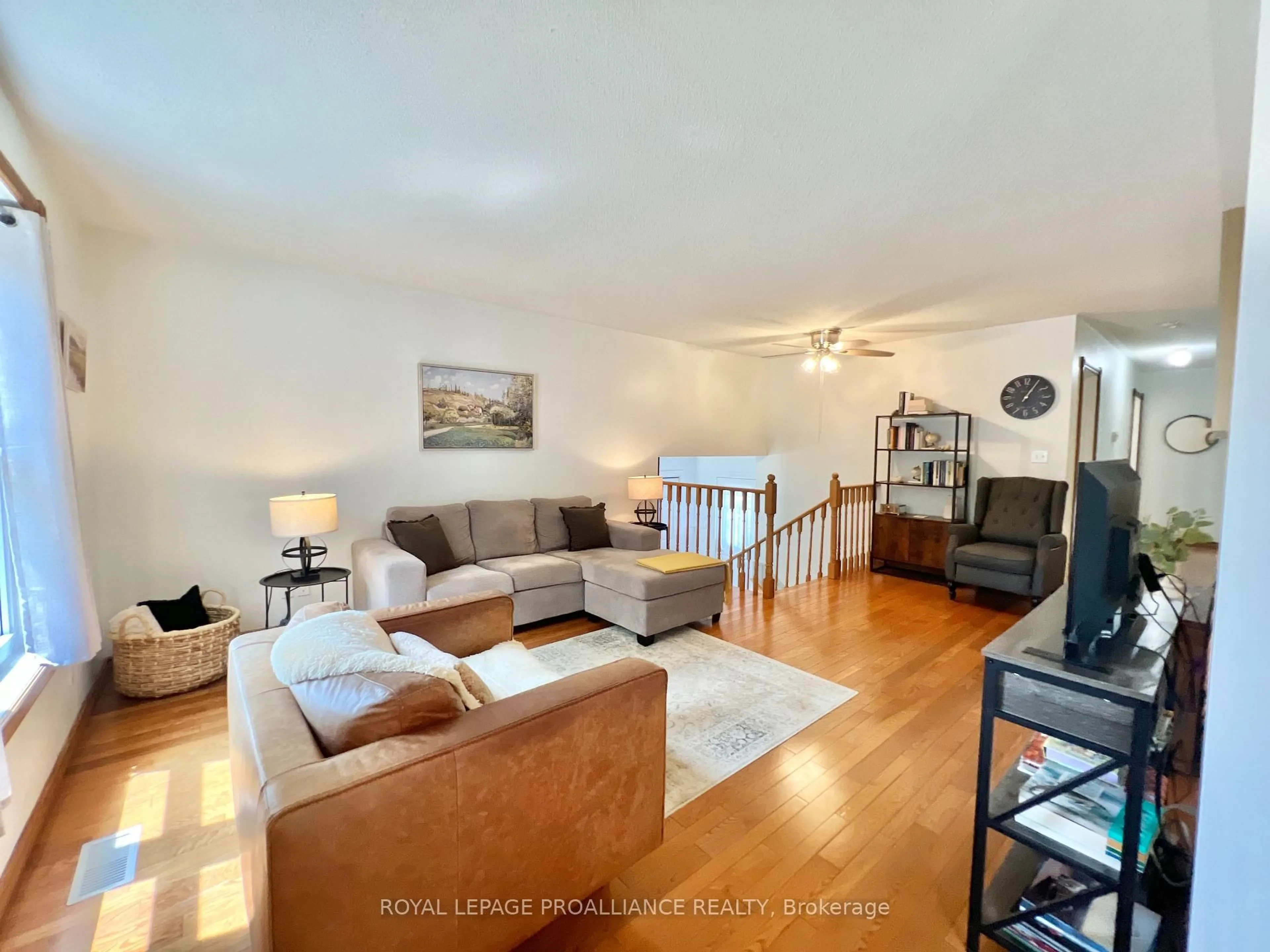 Living room with furniture, wood/laminate floor for 108 Elgin St, Madoc Ontario K0K 2K0