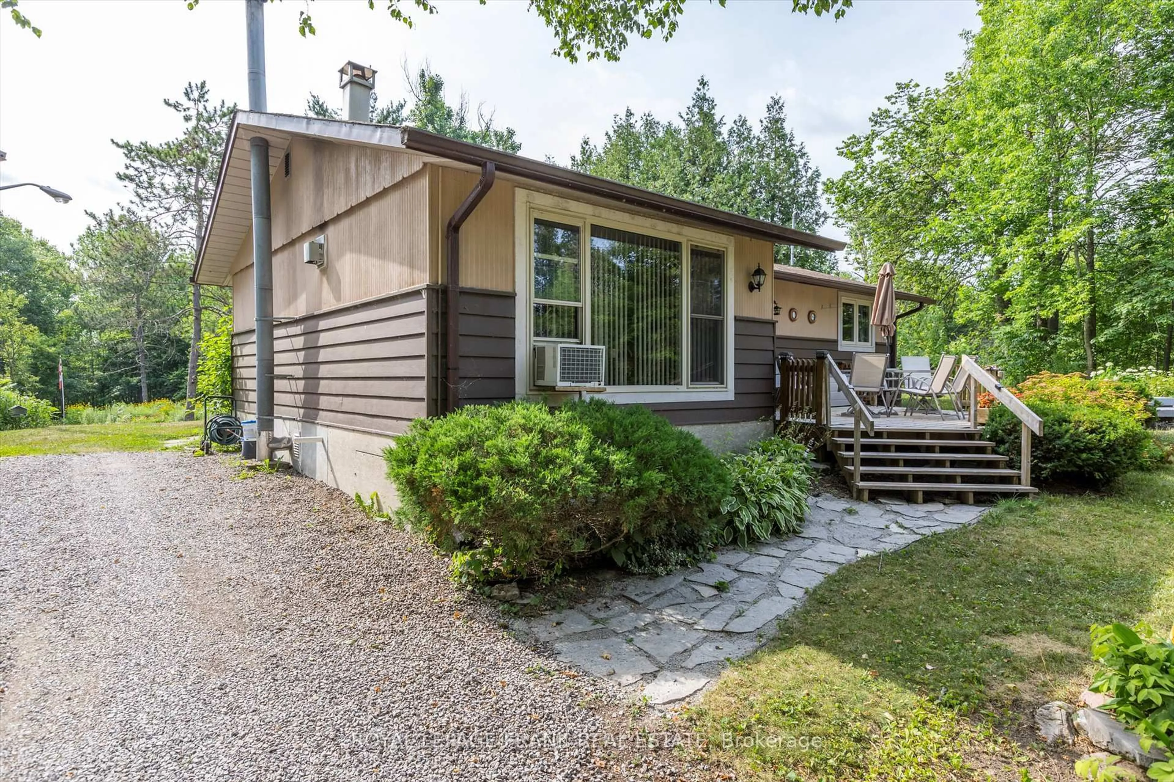 Home with vinyl exterior material, street for 10 Darvell Rd, Trent Lakes Ontario K0L 1J0