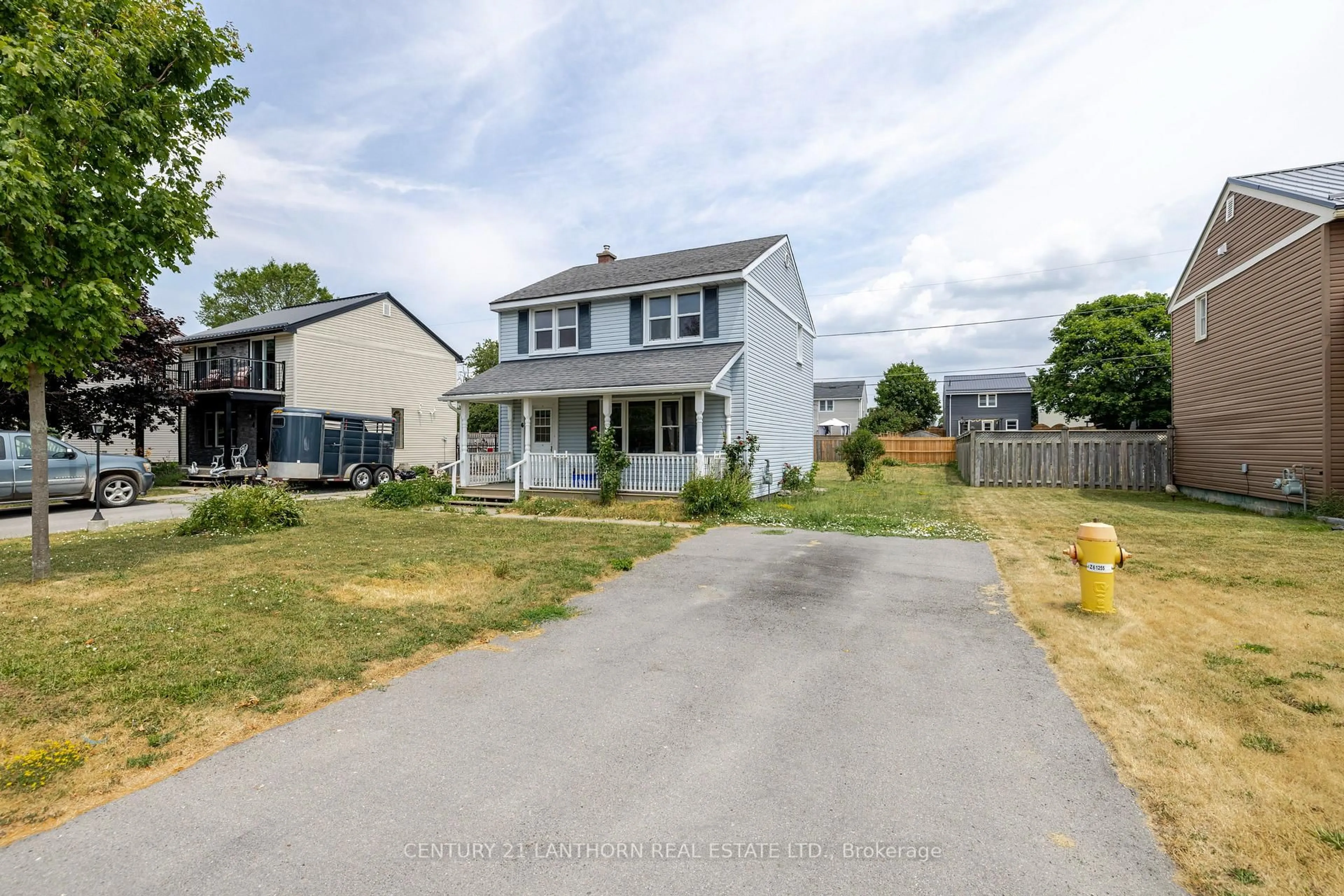 A pic from outside/outdoor area/front of a property/back of a property/a pic from drone, street for 6 Inkerman Ave, Prince Edward County Ontario K0K 2T0