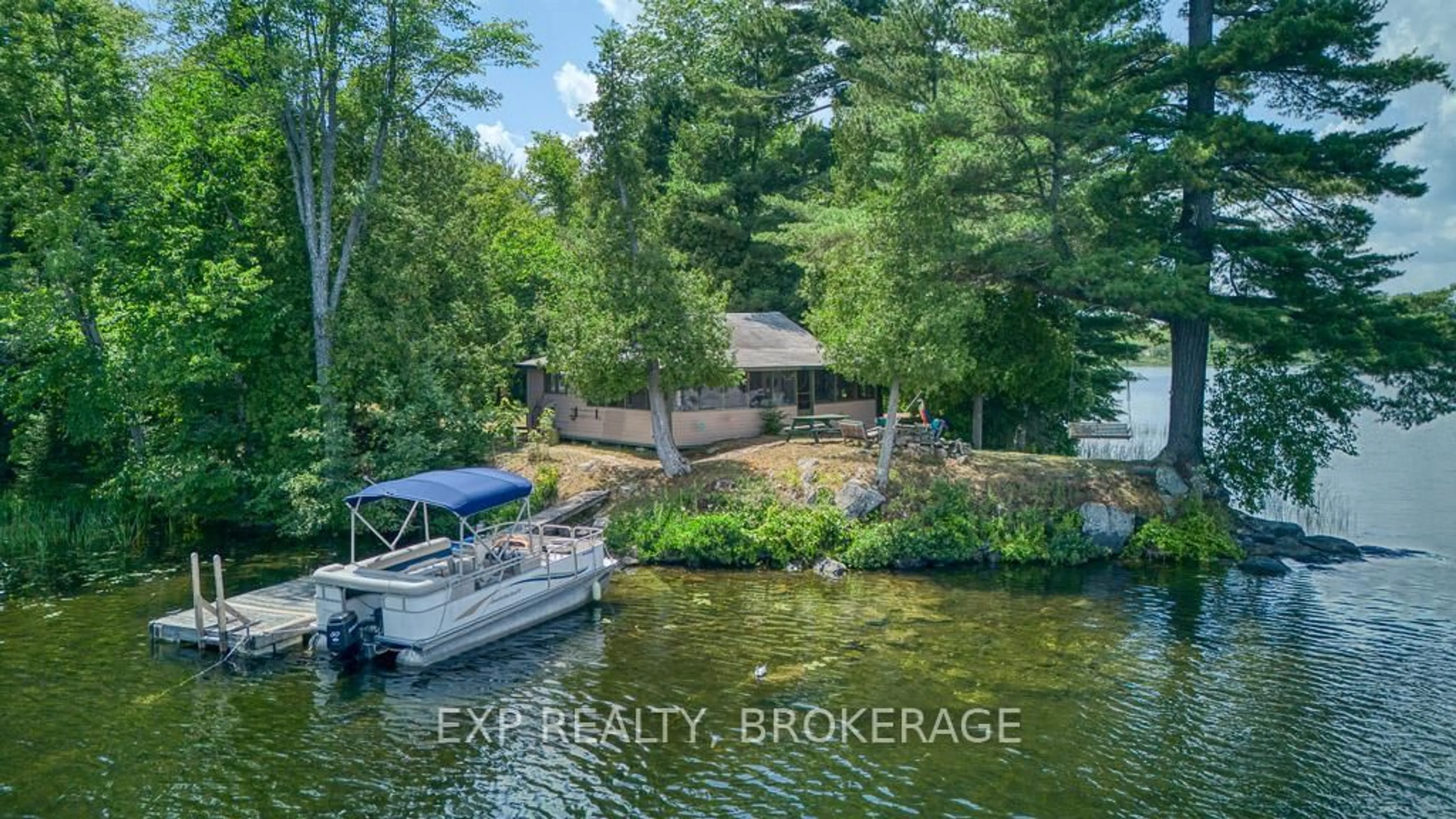A pic from outside/outdoor area/front of a property/back of a property/a pic from drone, water/lake/river/ocean view for C Island, Sharbot Lake Ontario K0H 2P0