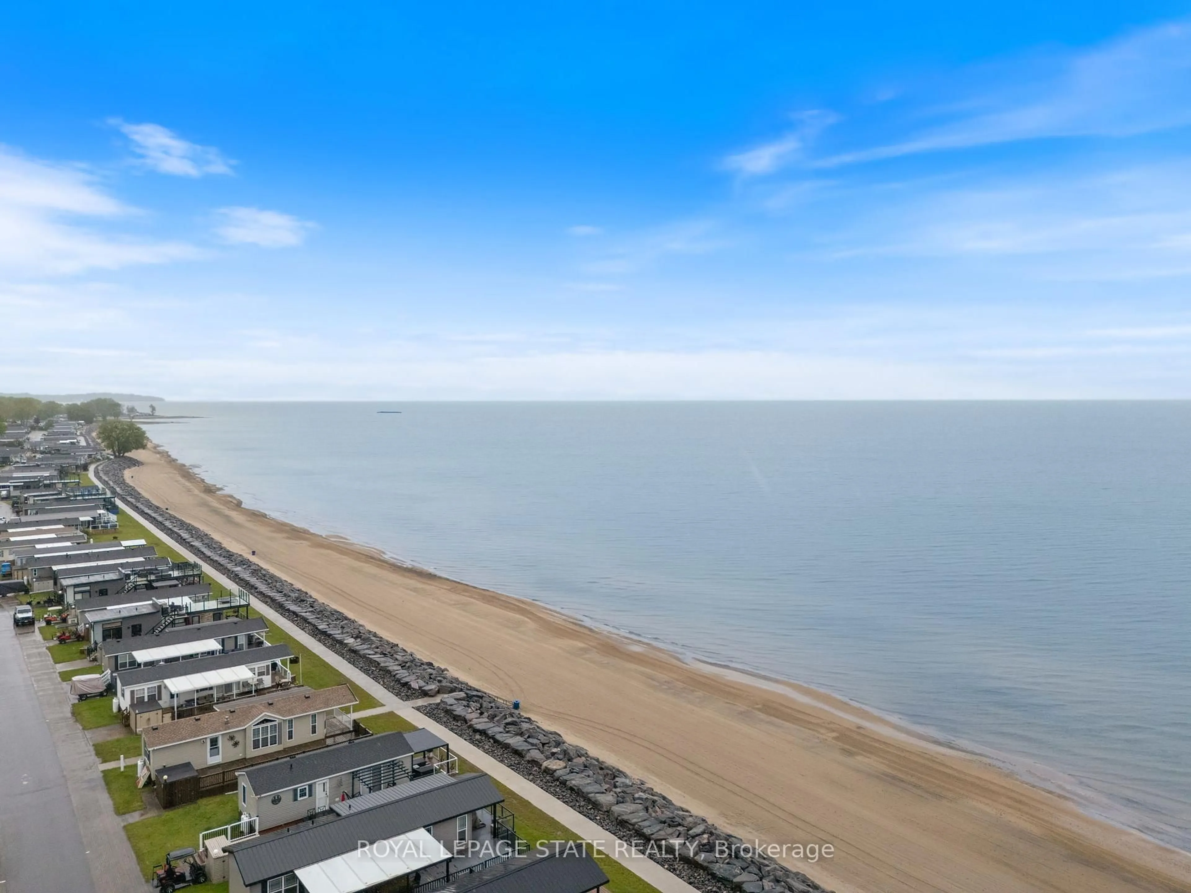 A pic from outside/outdoor area/front of a property/back of a property/a pic from drone, water/lake/river/ocean view for 490 Empire Rd #213, Port Colborne Ontario L0S 1R0