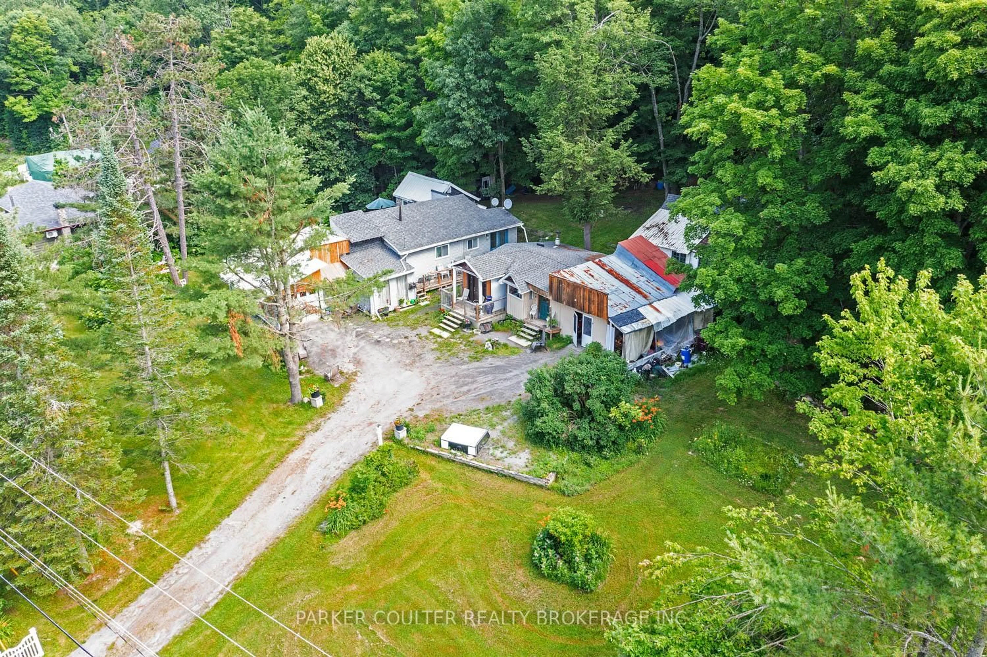 A pic from outside/outdoor area/front of a property/back of a property/a pic from drone, unknown for 1291 Muskoka Rd 118, Bracebridge Ontario P1L 1W8