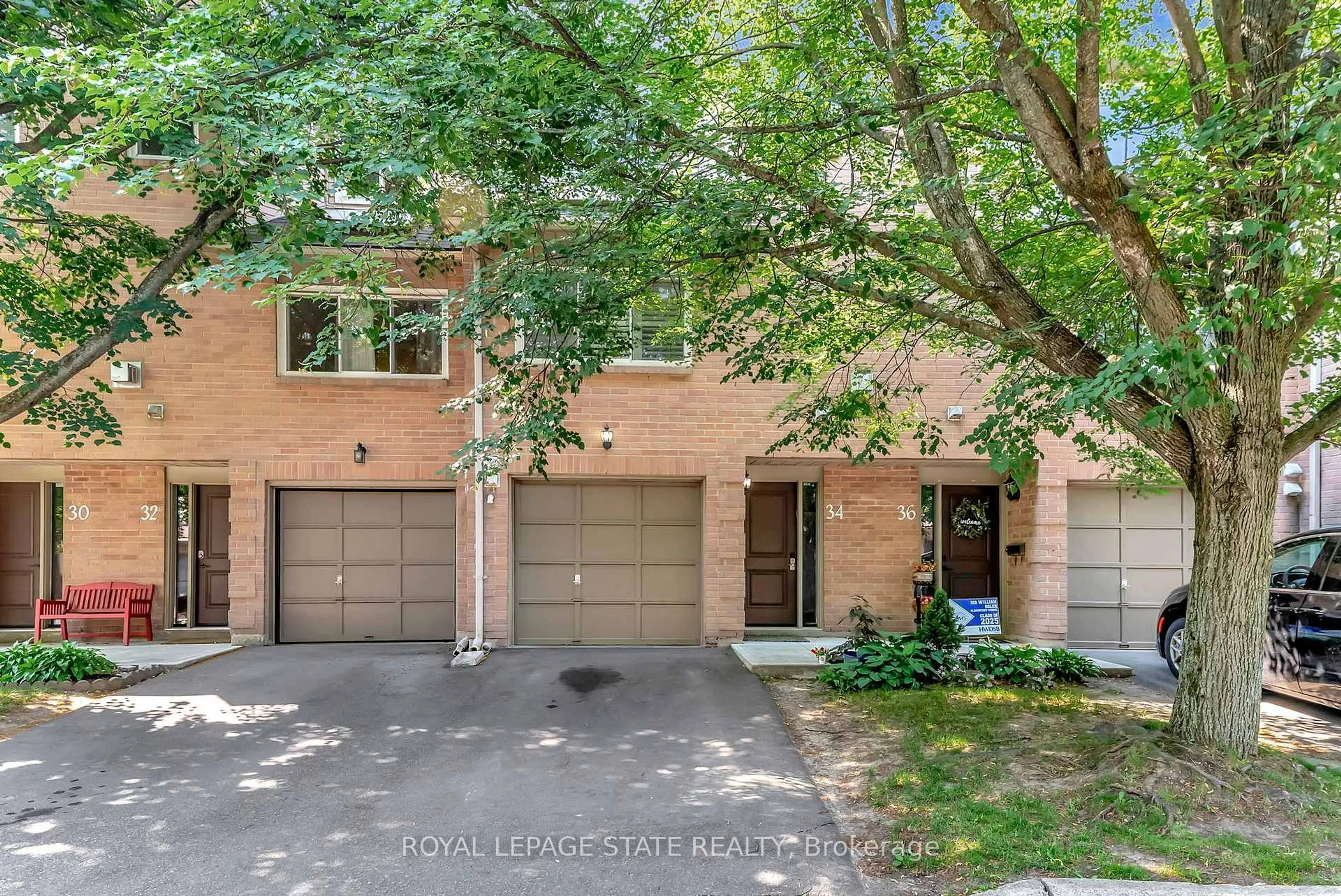 Home with brick exterior material, street for 26 Moss Blvd #34, Hamilton Ontario L9H 6W7