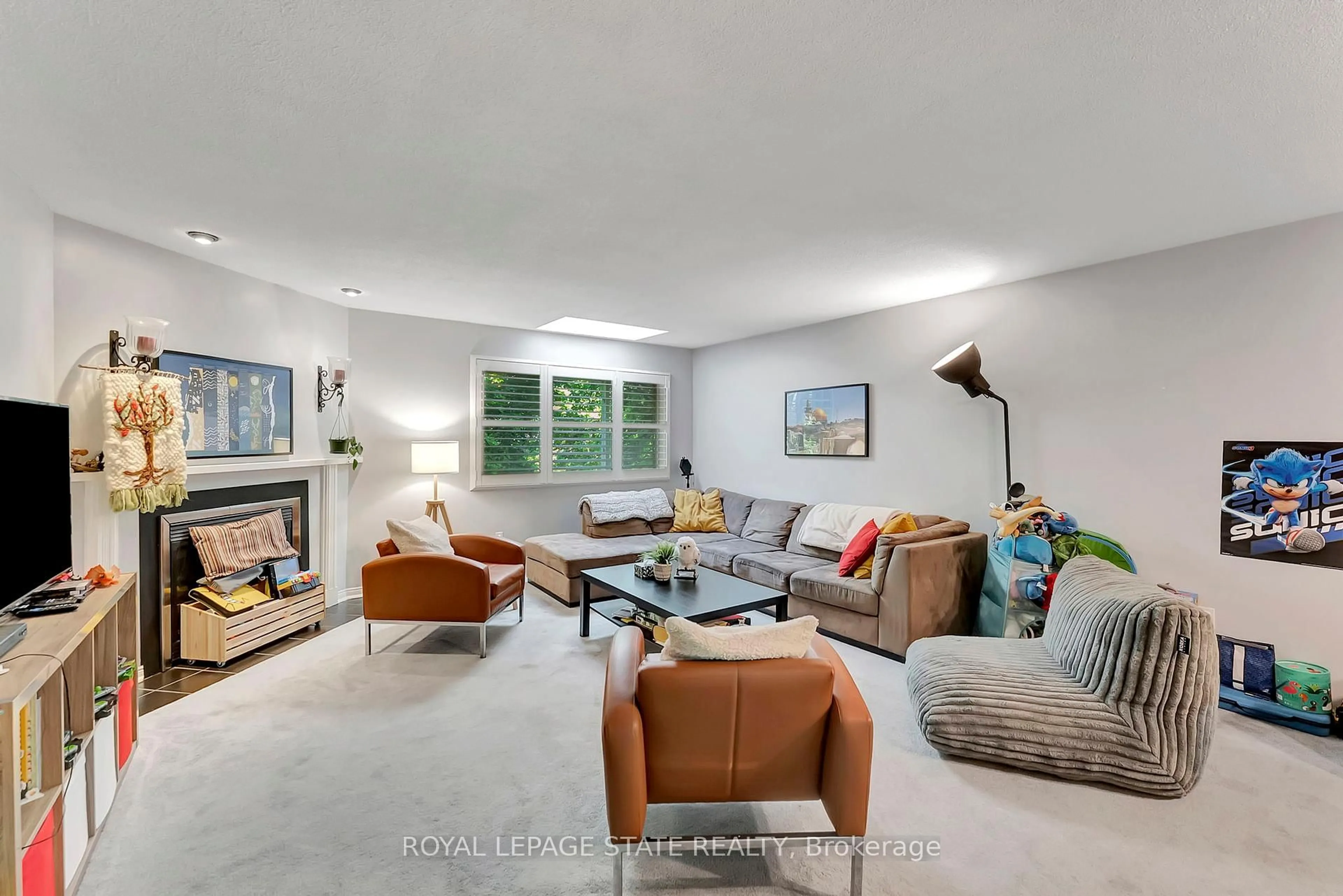 Living room with furniture, unknown for 26 Moss Blvd #34, Hamilton Ontario L9H 6W7