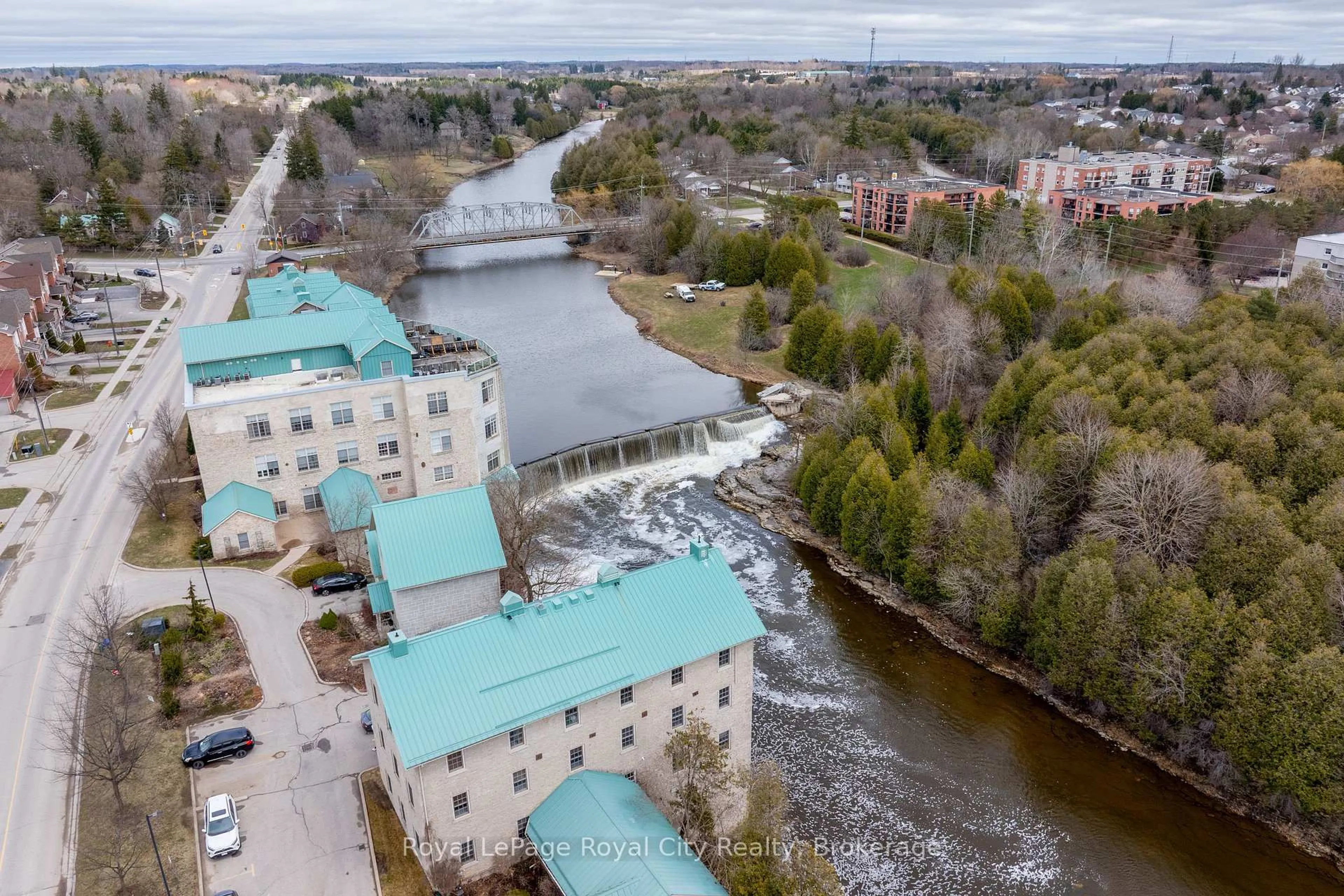 A pic from outside/outdoor area/front of a property/back of a property/a pic from drone, water/lake/river/ocean view for 470 St Andrew St #202, Centre Wellington Ontario N1M 1P3